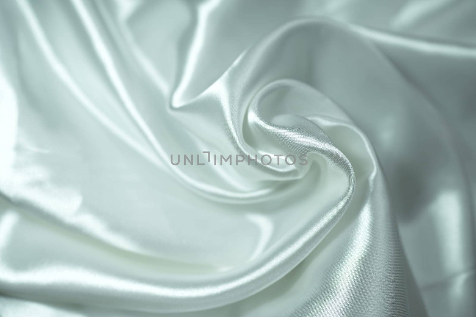 white satin fabric background by nantachai