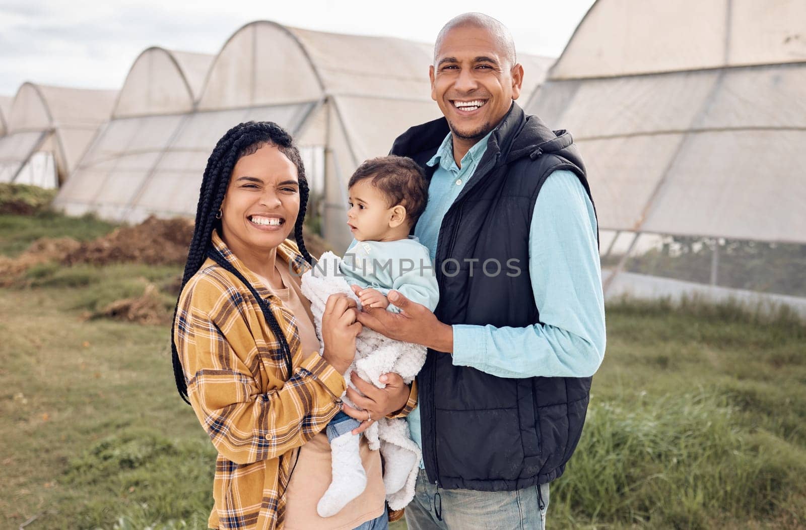 Mother, father and baby in portrait at farm, outdoor and happy for infant kid, growth and sustainable small business. Black family, child and smile for farming sustainability with love by greenhouse.