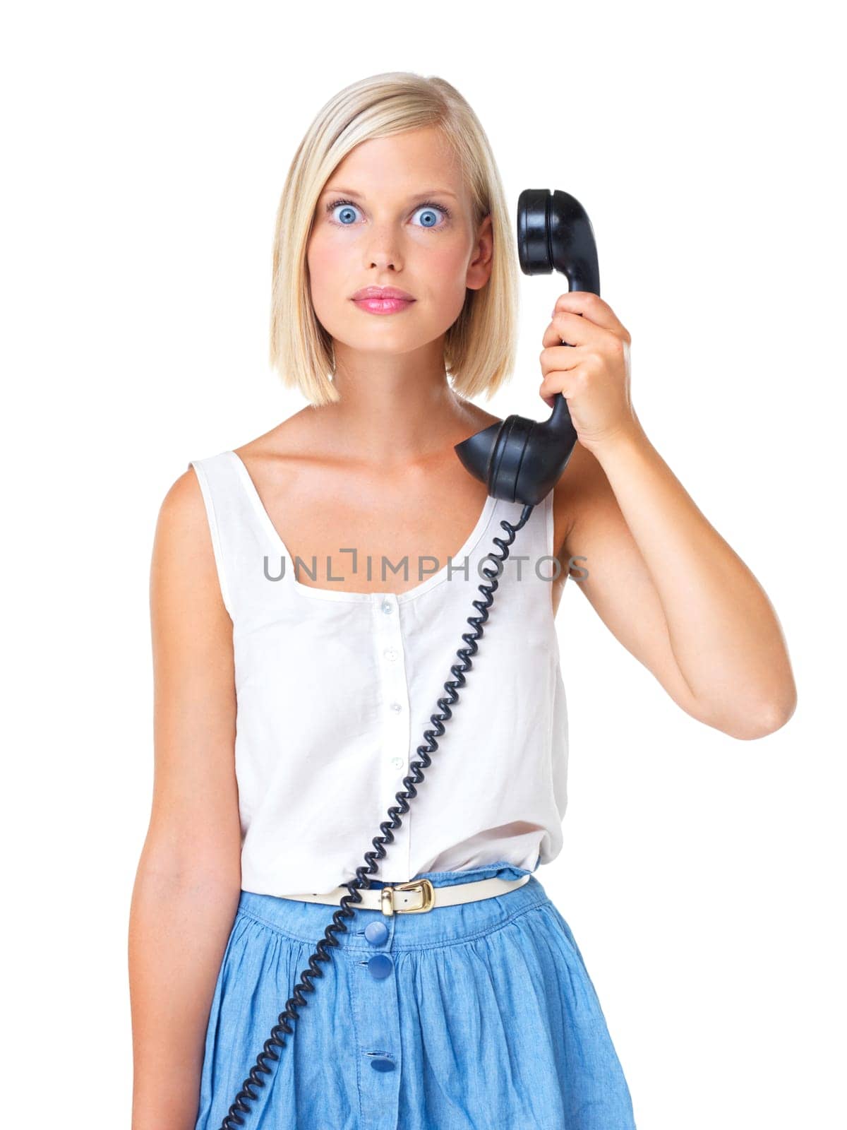 Woman, telephone call and surprise in portrait, shocked facial expression with communication isolated on white background. Wow, retro technology and young female with omg face, vintage and connection.