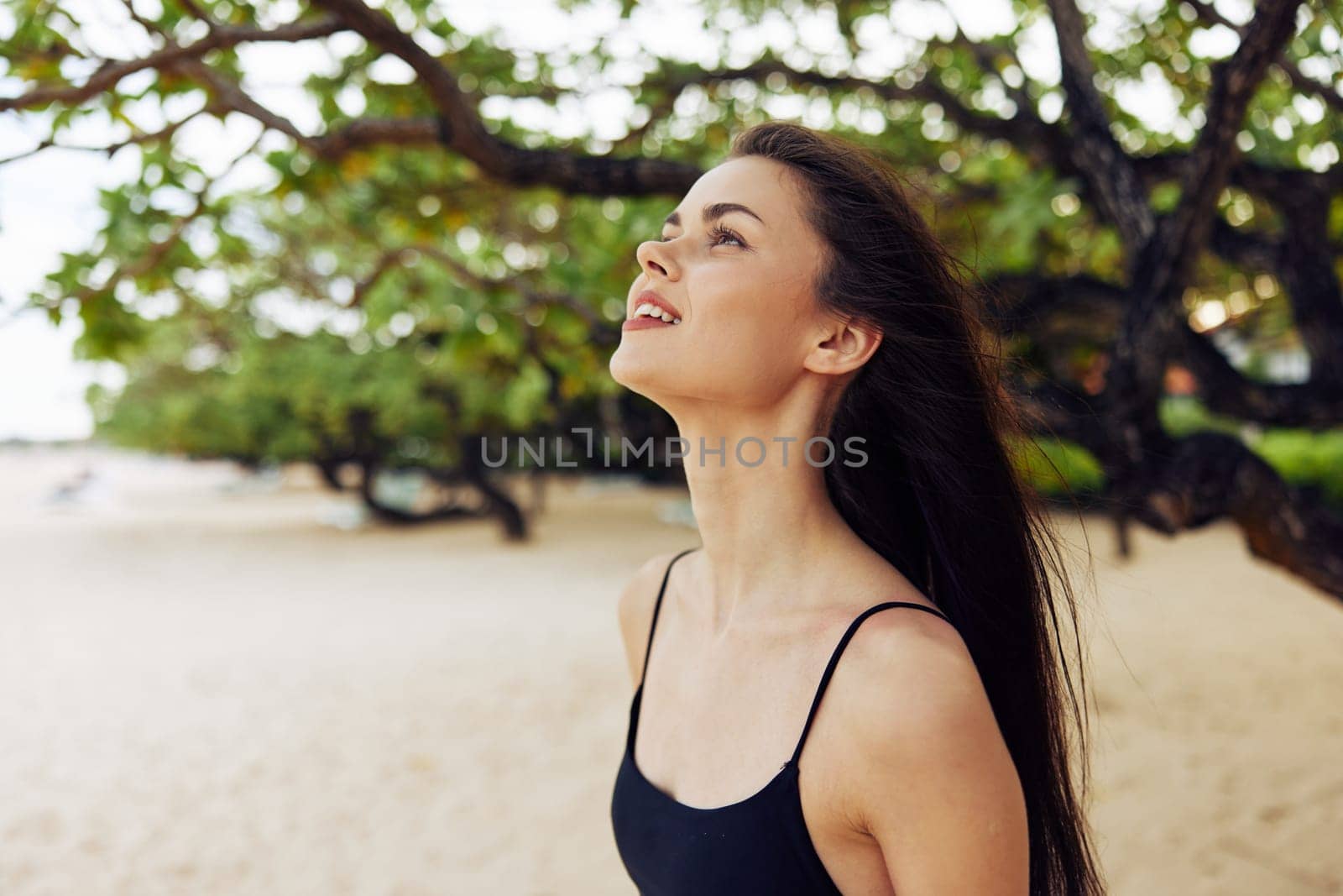 woman carefree leisure adult walking hair nature female long sea smile young water ocean person vacation sand running beach shore summer coast