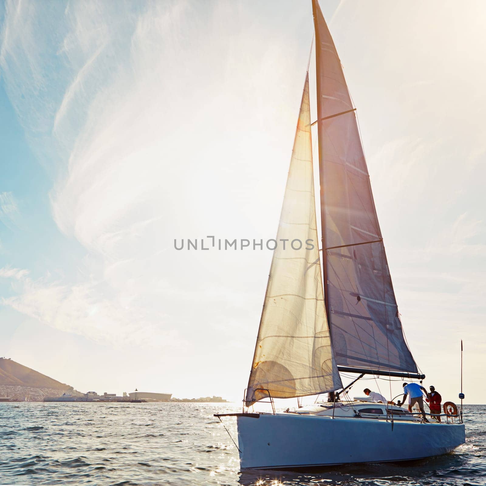 Ocean, yacht travel and sailing on the sea on vacation by summer sunshine on water. Lens flare, luxury holiday adventure and boat cruise of people in the sun and blue sky in nature with mockup by YuriArcurs