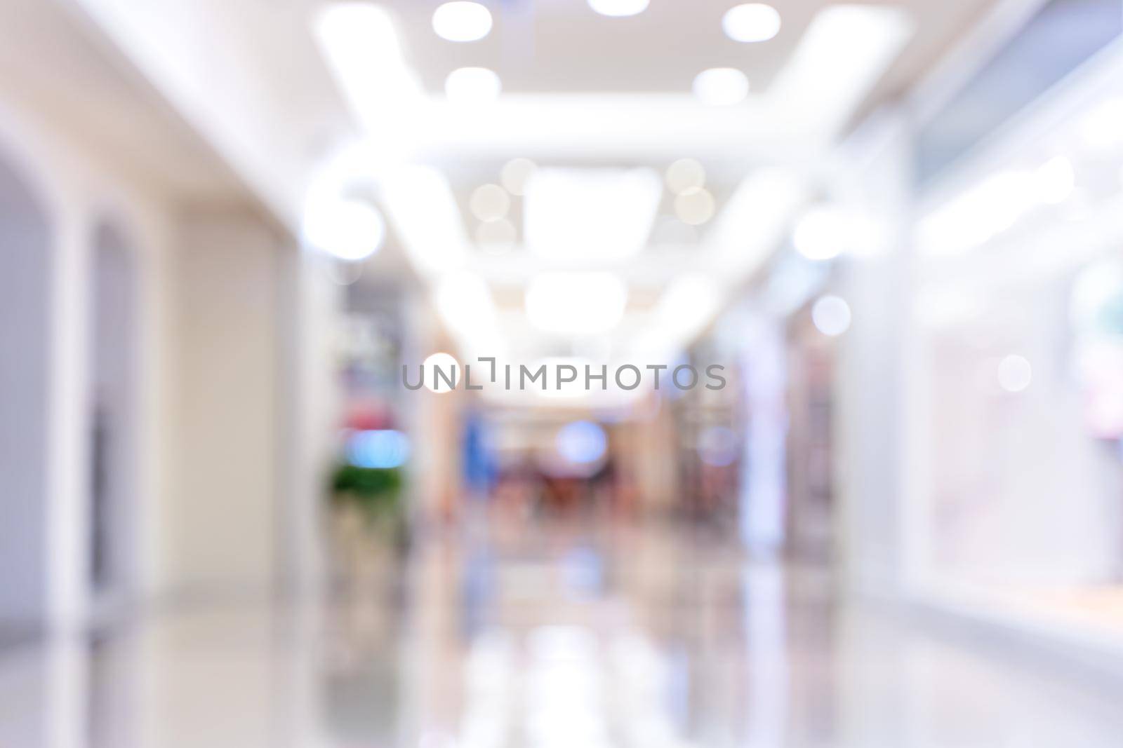 Luxury department store shopping mall interior, abstract defocused blur with bokeh background, concept of shopping seasons design. by ROMIXIMAGE