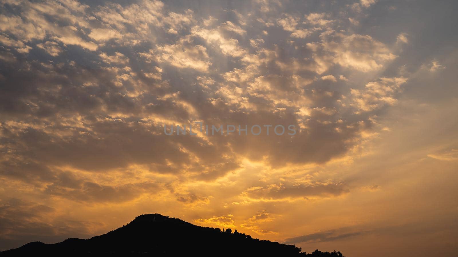 Landscape of silhouette mountain and clouds sunset lighting by Wmpix
