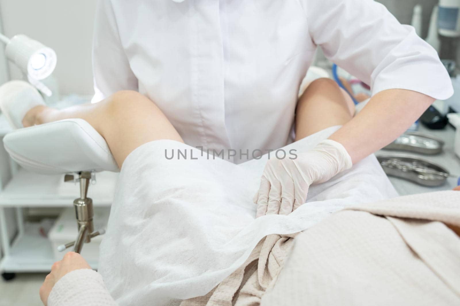 Patient with a gynecologist during the consultation in gynecological office