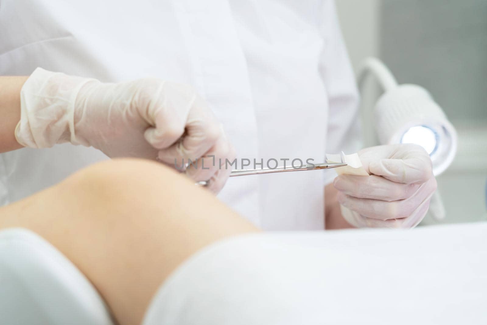 Young woman patient with a gynecologist during the consultation in the gynecological office