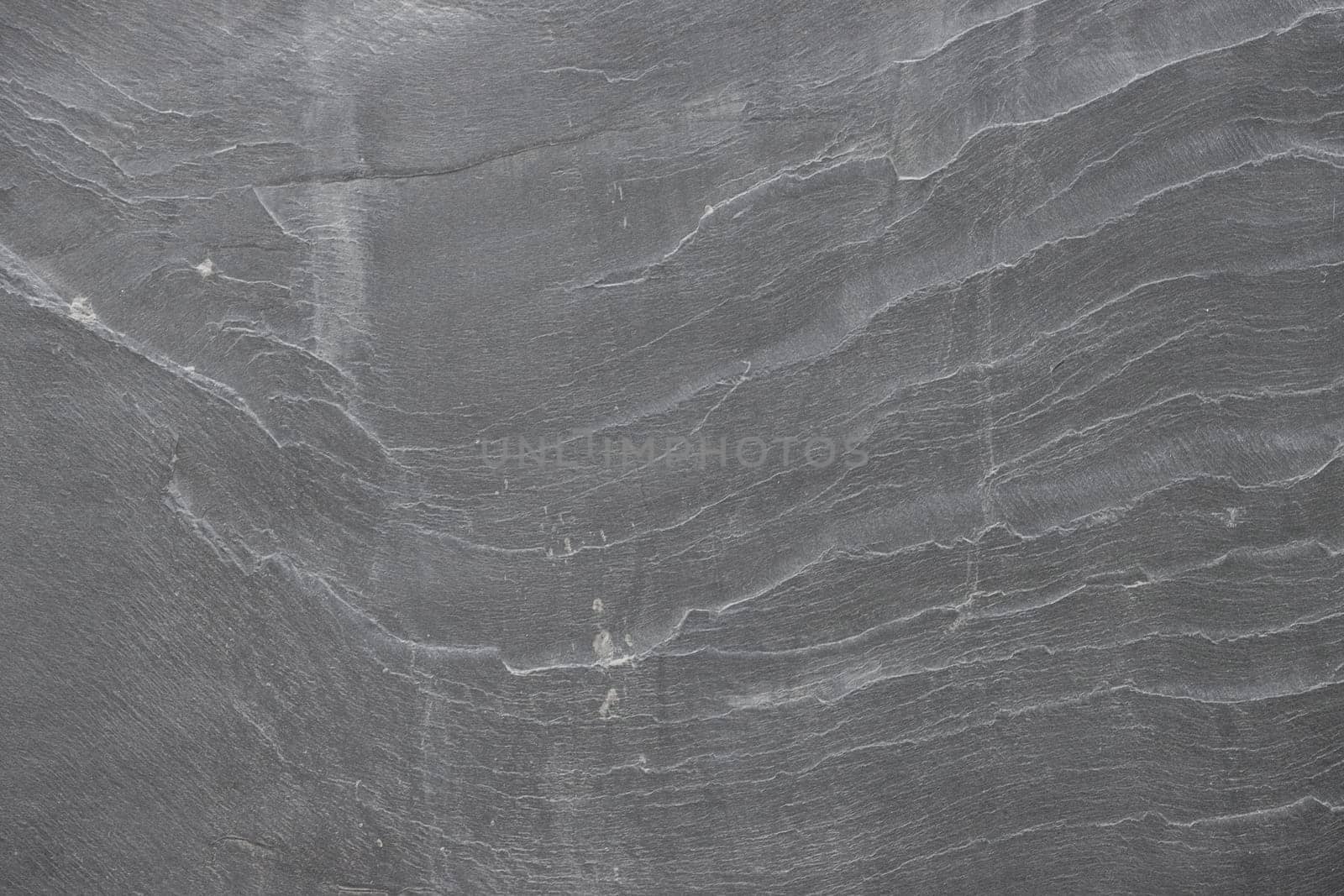 Gray granite texture on the wall.