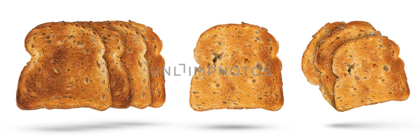 Big set of different toasted bread slices from toaster isolated on white background. Diet food or light breakfast concept, golden bread slices for design or project. High quality photo