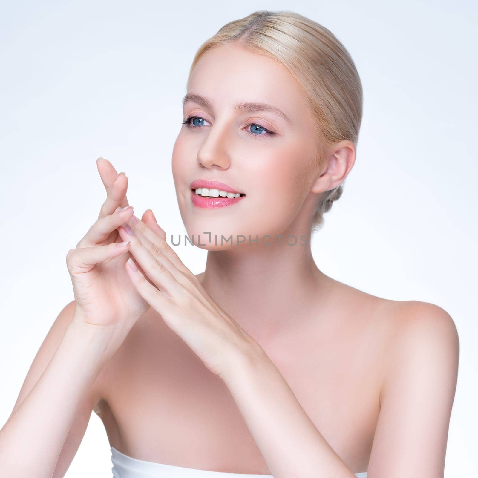 Personable beautiful woman portrait with perfect smooth clean skin and natural makeup portrait in isolated background. Hand gesture with expressive facial expression for beauty model concept.