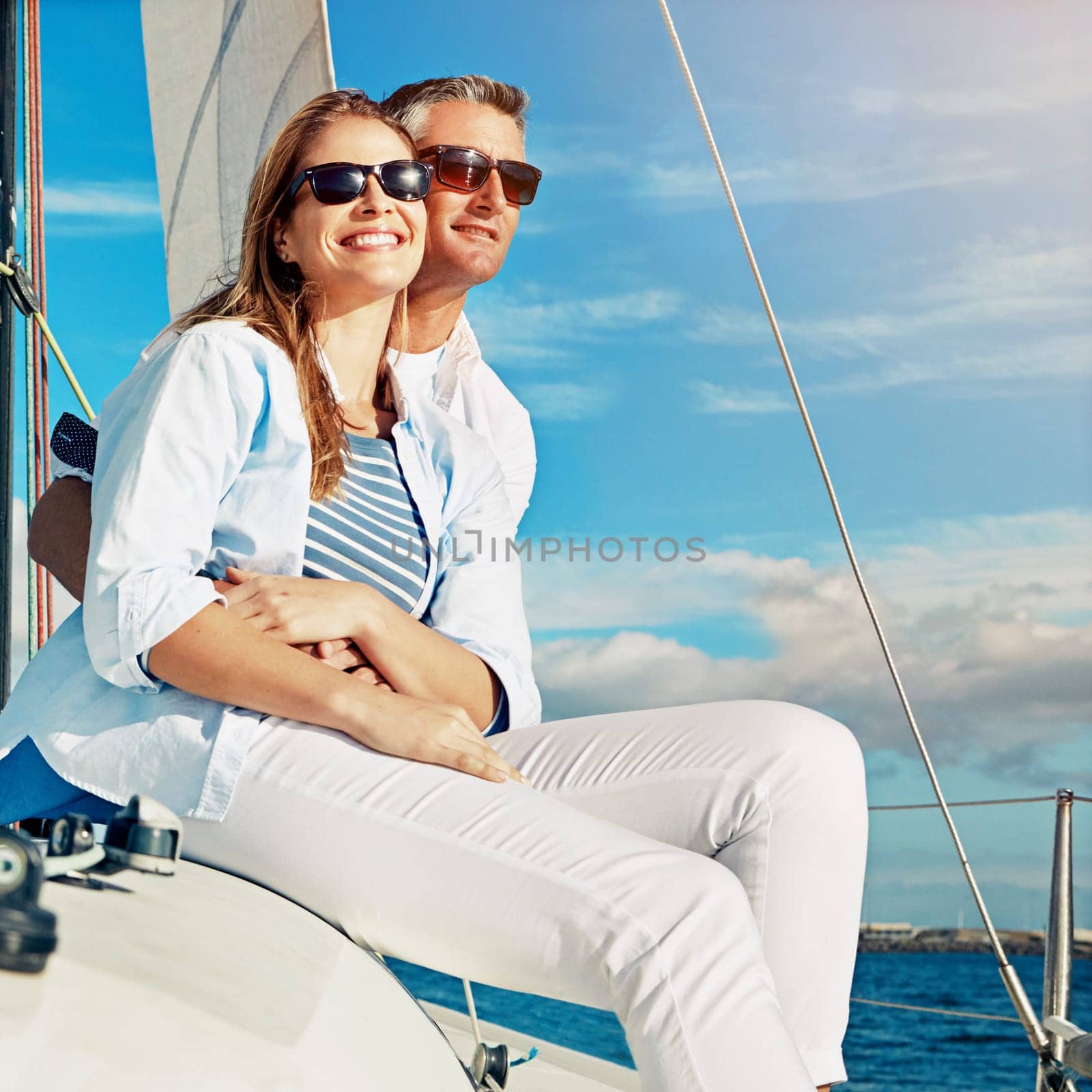 Relax, travel and luxury with couple on yacht for summer, love and sunset on Rome vacation trip. Adventure, journey and vip with man hug woman sailing on boat for ocean, tropical and honeymoon at sea by YuriArcurs
