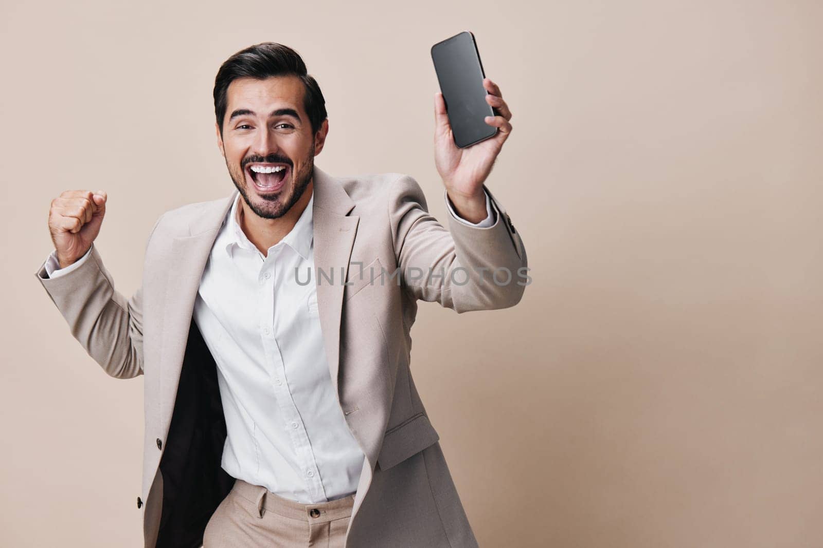 man hold suit portrait call cellphone smile smartphone business phone happy by SHOTPRIME