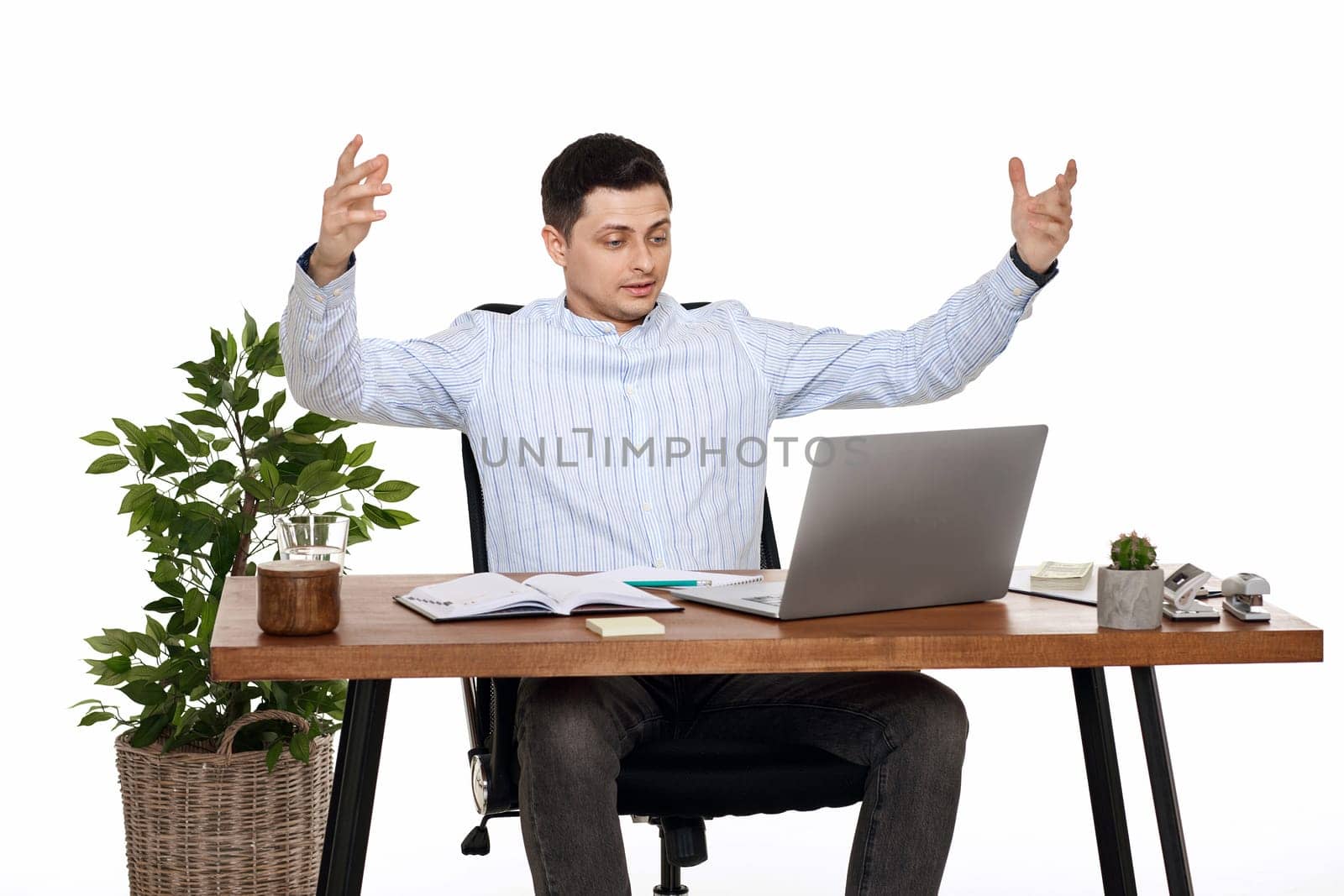 frustrated businessman gesturing emotionally in the office on white background