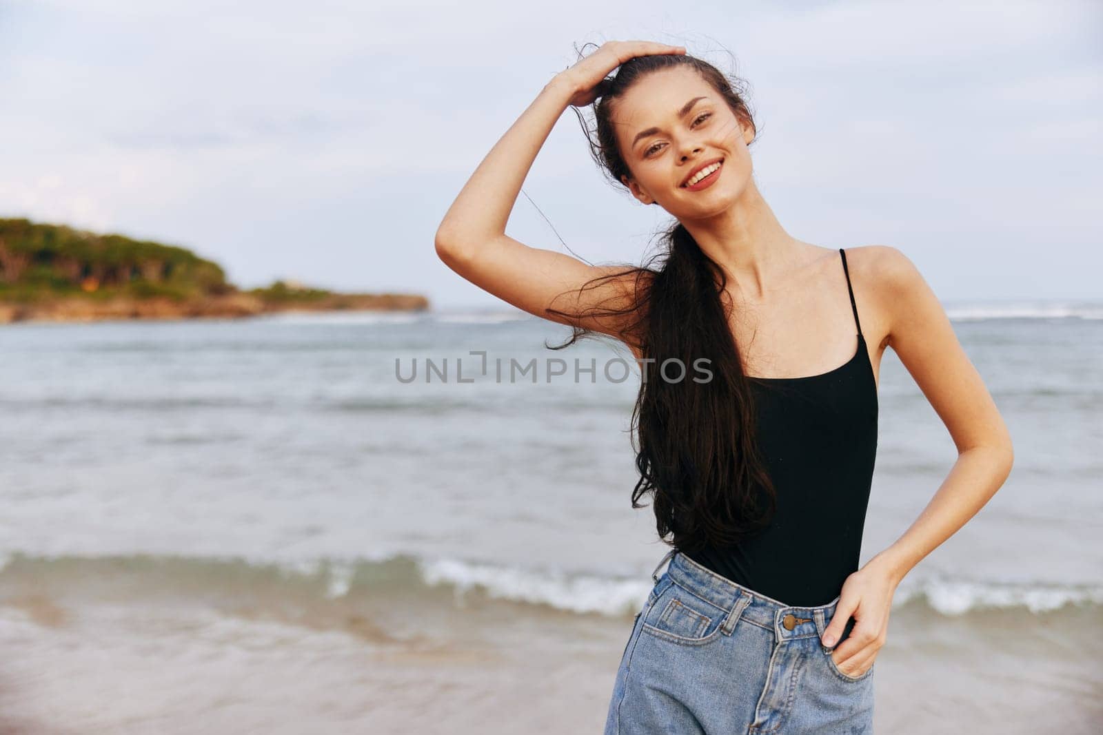 sea woman summer smile free coast lifestyle holiday relax sunlight ocean beach carefree freedom peaceful travel vacation caucasian sand young sunset