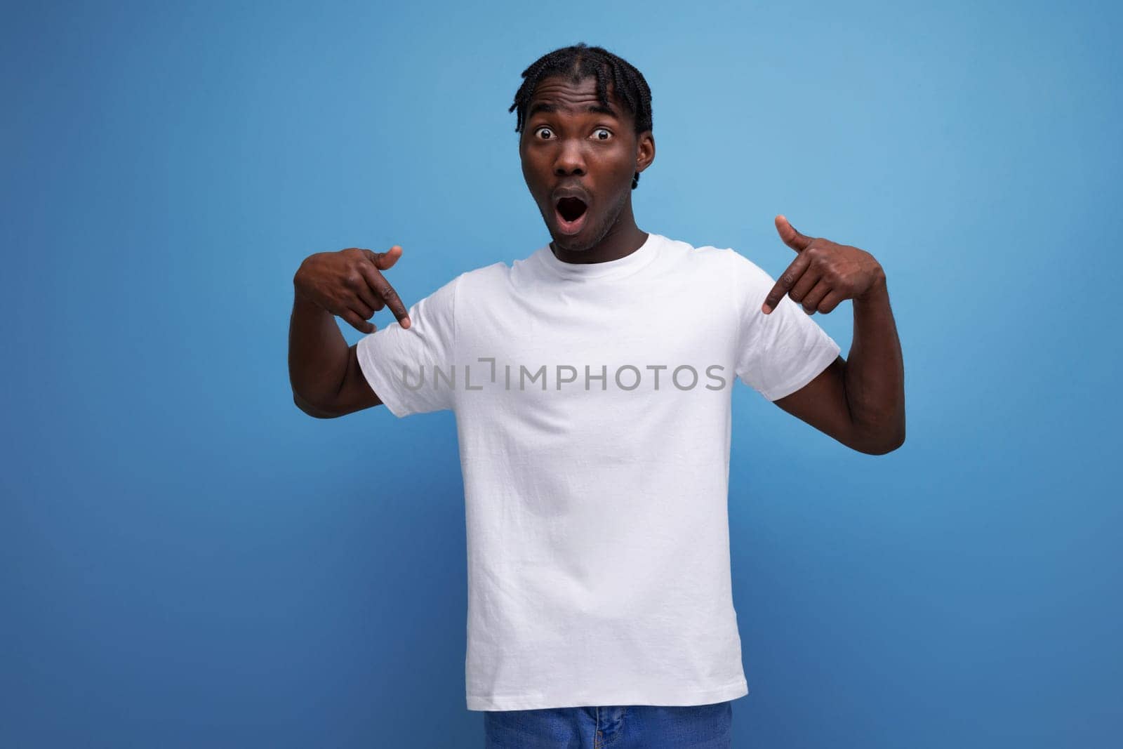 african young man with dreadlocks dressed in a white t-shirt for thermal printing.