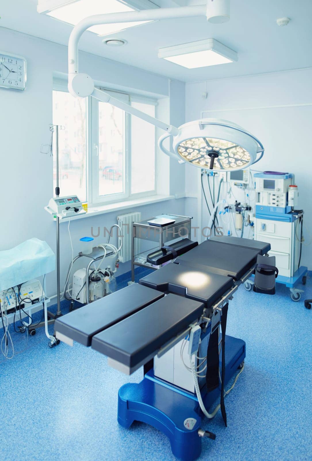 Interior of operating room in modern clinic.