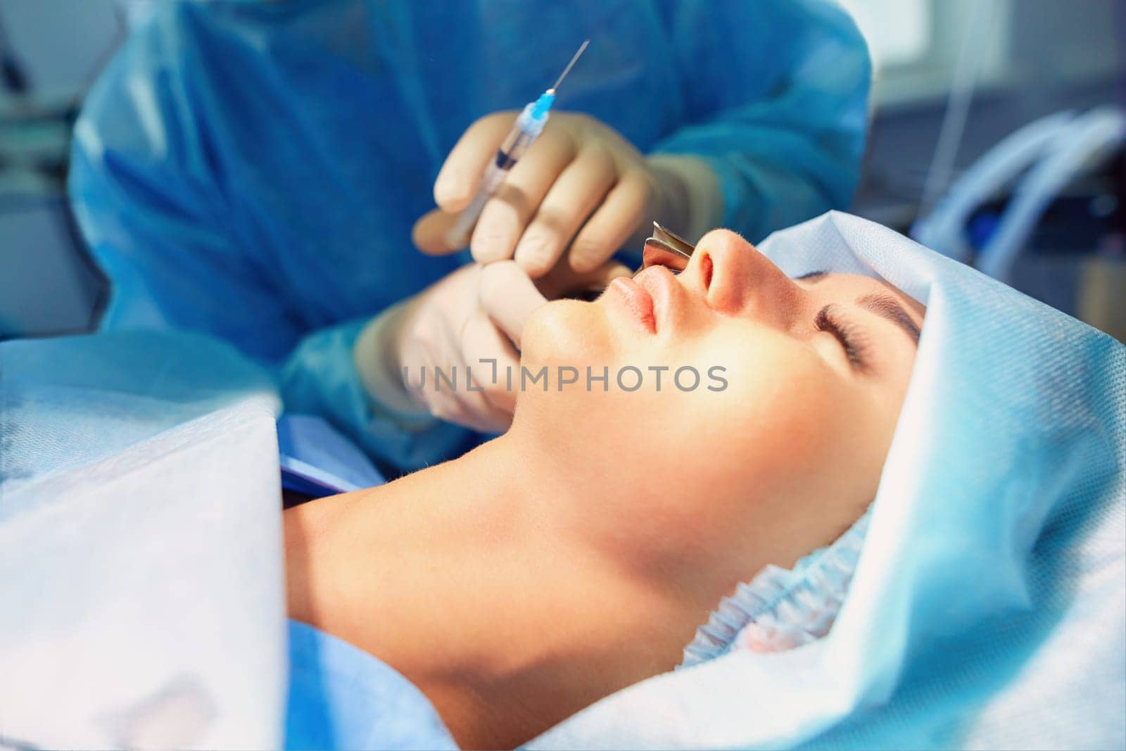 Male surgeon on background in operation room.