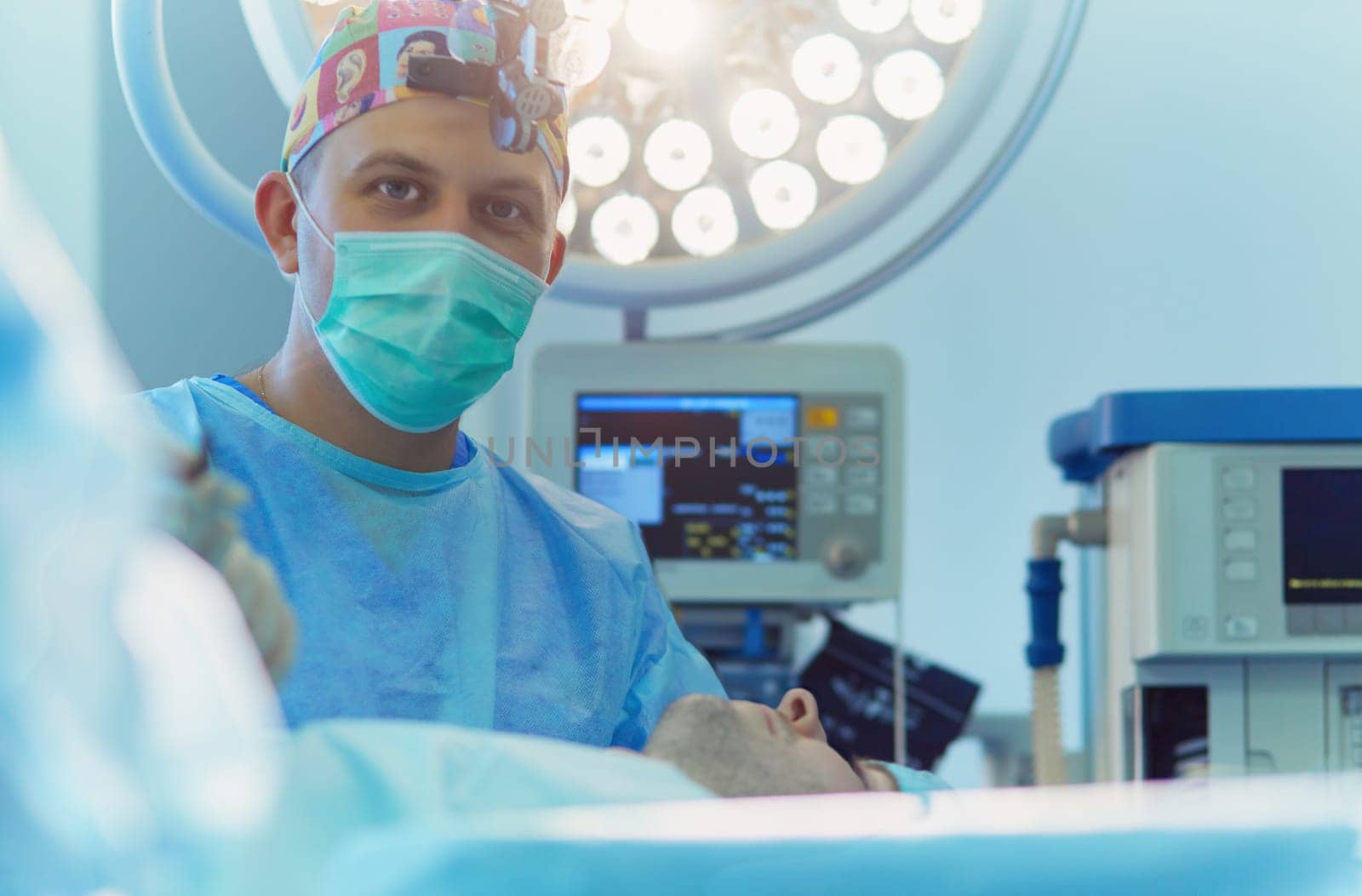 Male surgeon on background in operation room.