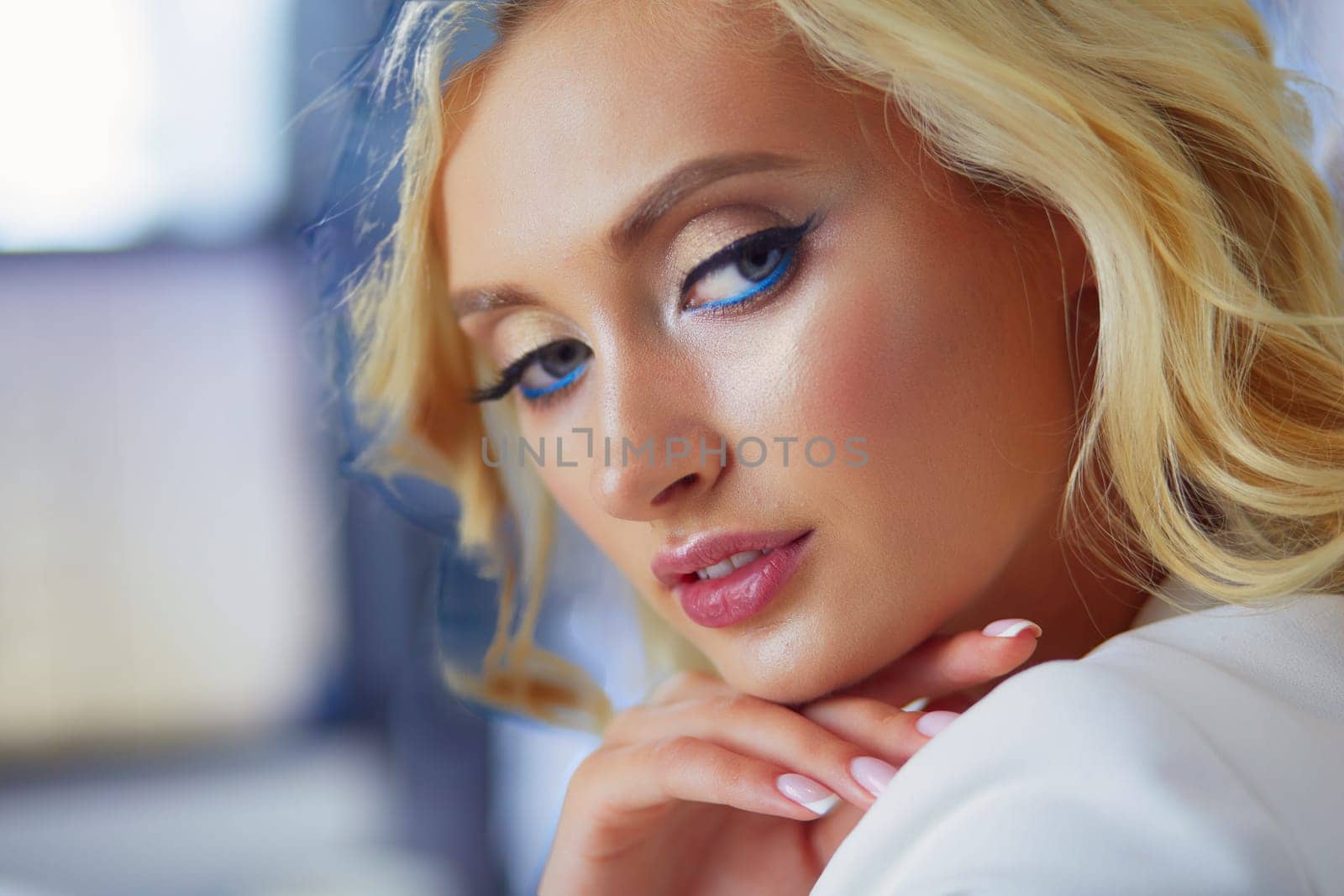 Beautiful young woman portrait , sitting in office