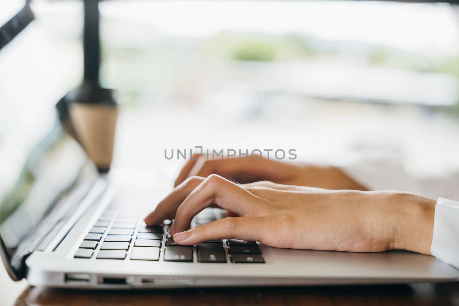 Happy beautiful freelancer blogger typing keyboard on laptop for writing blog web page by Sorapop