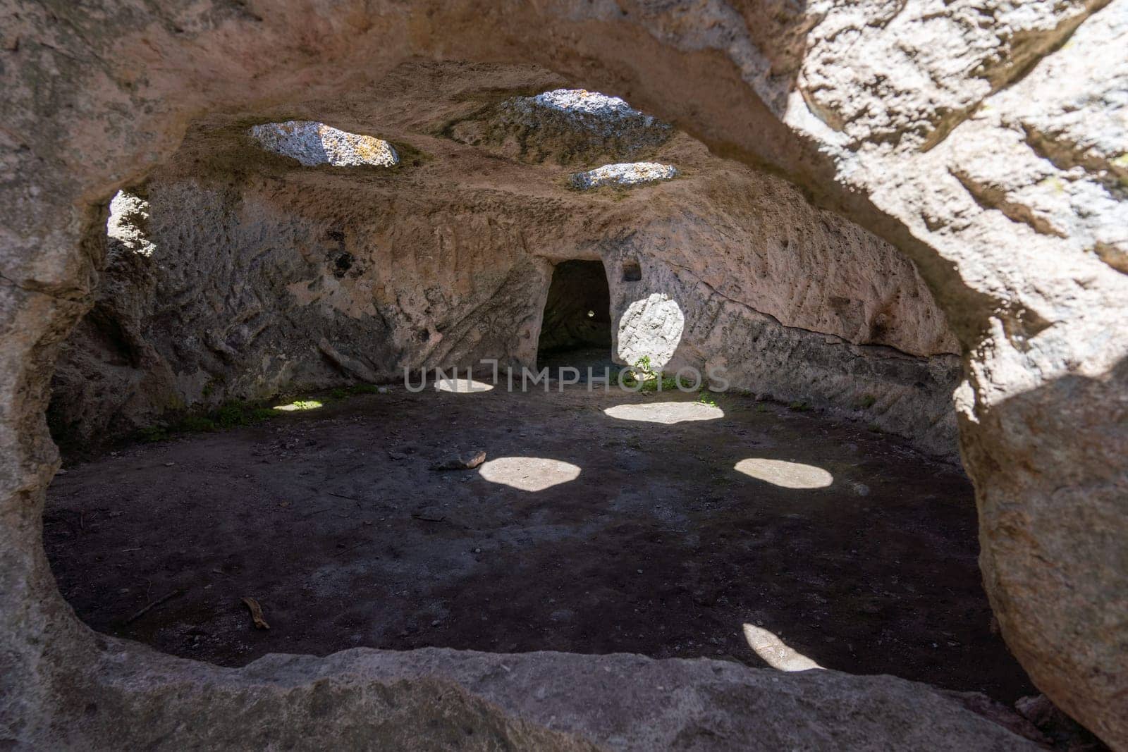 Ancient cave city. Inside the cave, view from the window