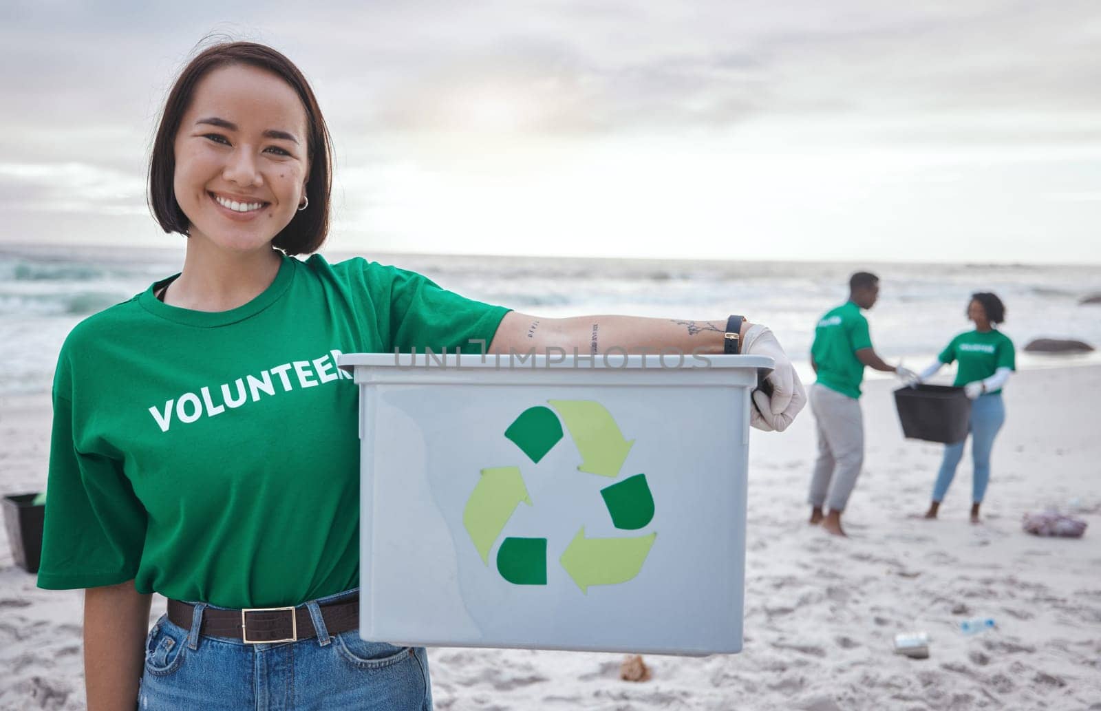 Cleaning, recycle and portrait of asian woman at beach for plastic, environment or earth day. Recycling, sustainability and climate change with volunteer and trash for pollution and eco friendly.