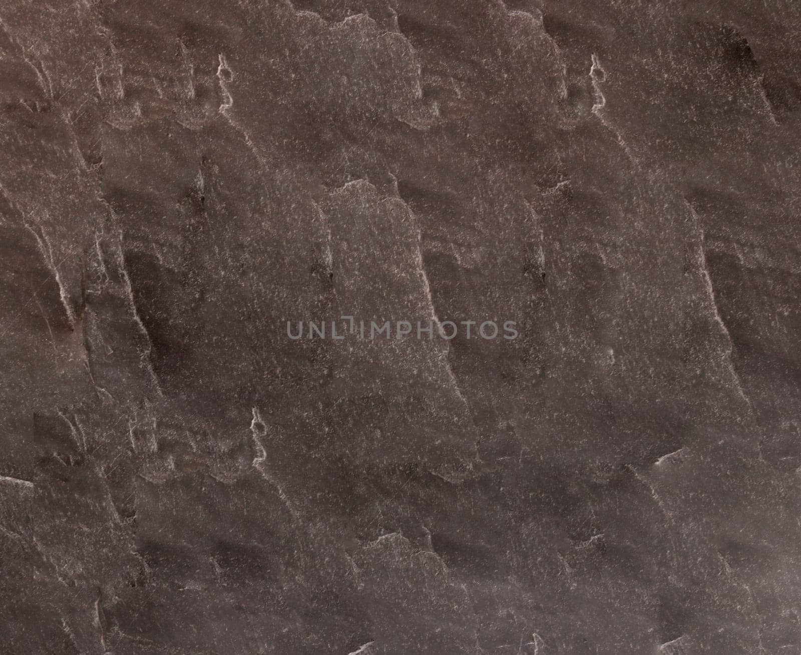 Texture with spots on the stone surface. Background for design with copy space.