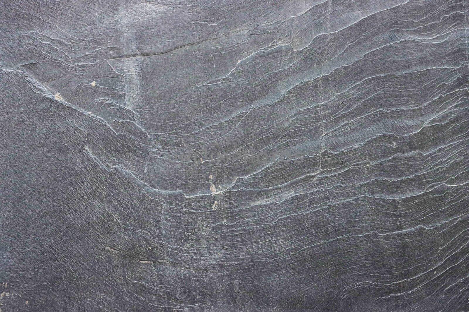 Gray granite texture on the wall.