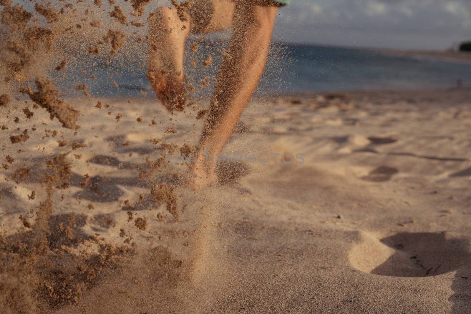 close-up. feet in the sand. run. bali