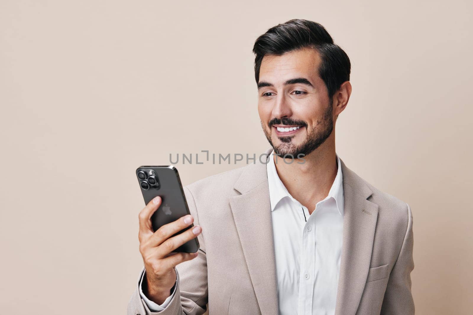 man business phone confident phone holding blogger happy smile mobile white suit hold app call portrait mobile cell businessman selfies smartphone communication