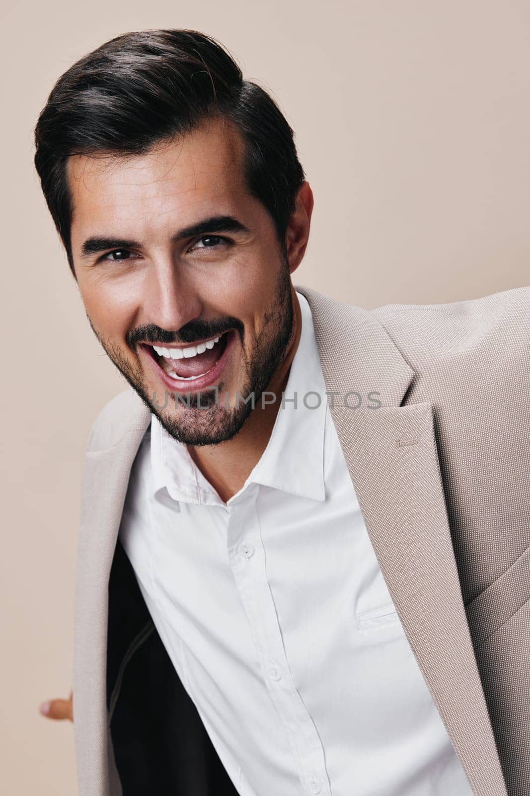 man smiling beige suit handsome business executive happy portrait businessman copyspace by SHOTPRIME