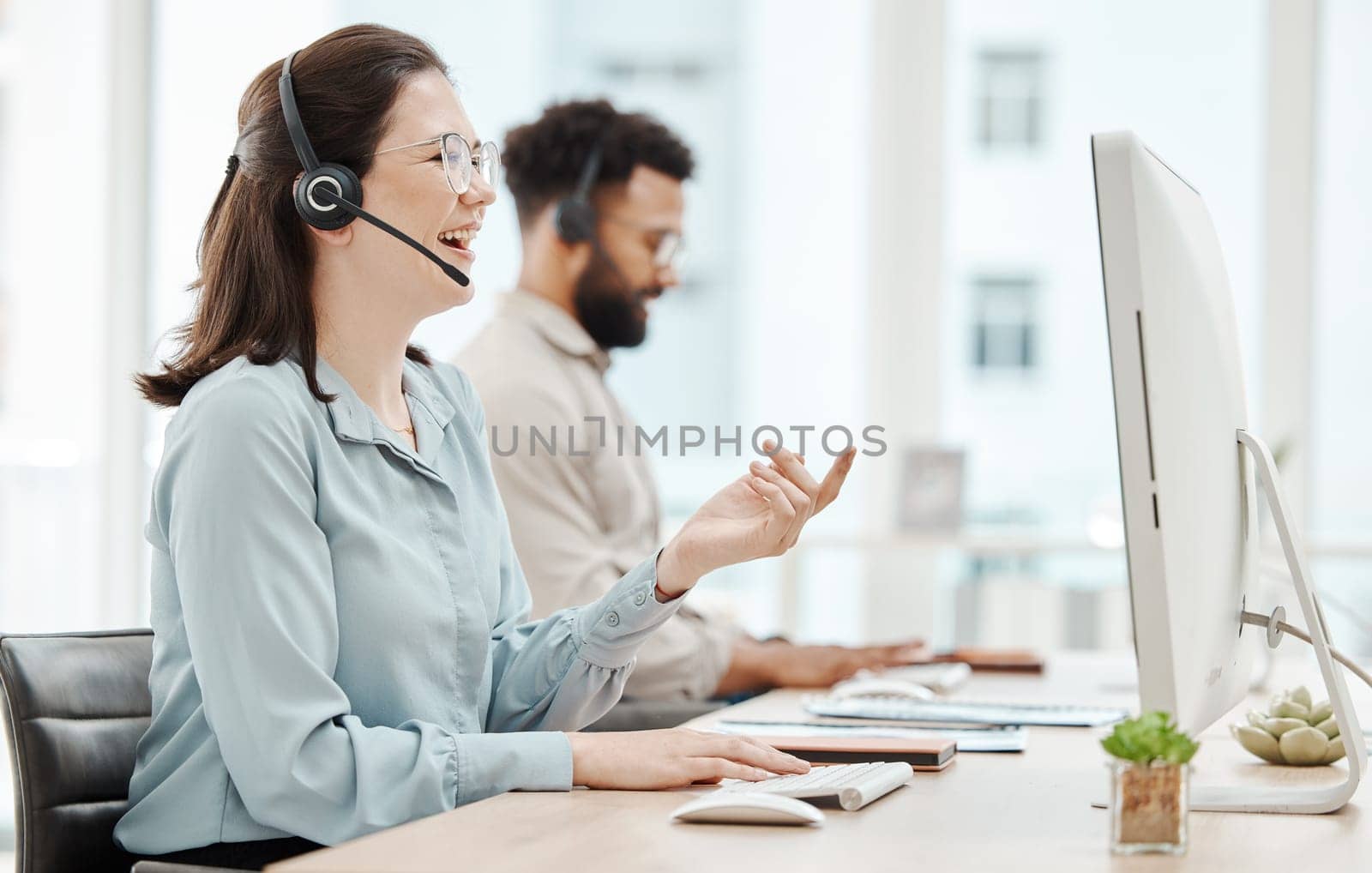Call center, contact us and woman, phone call in business for customer service or telemarketing. Desk with computer, consulting with customer, consultant or agent, communication and support. by YuriArcurs