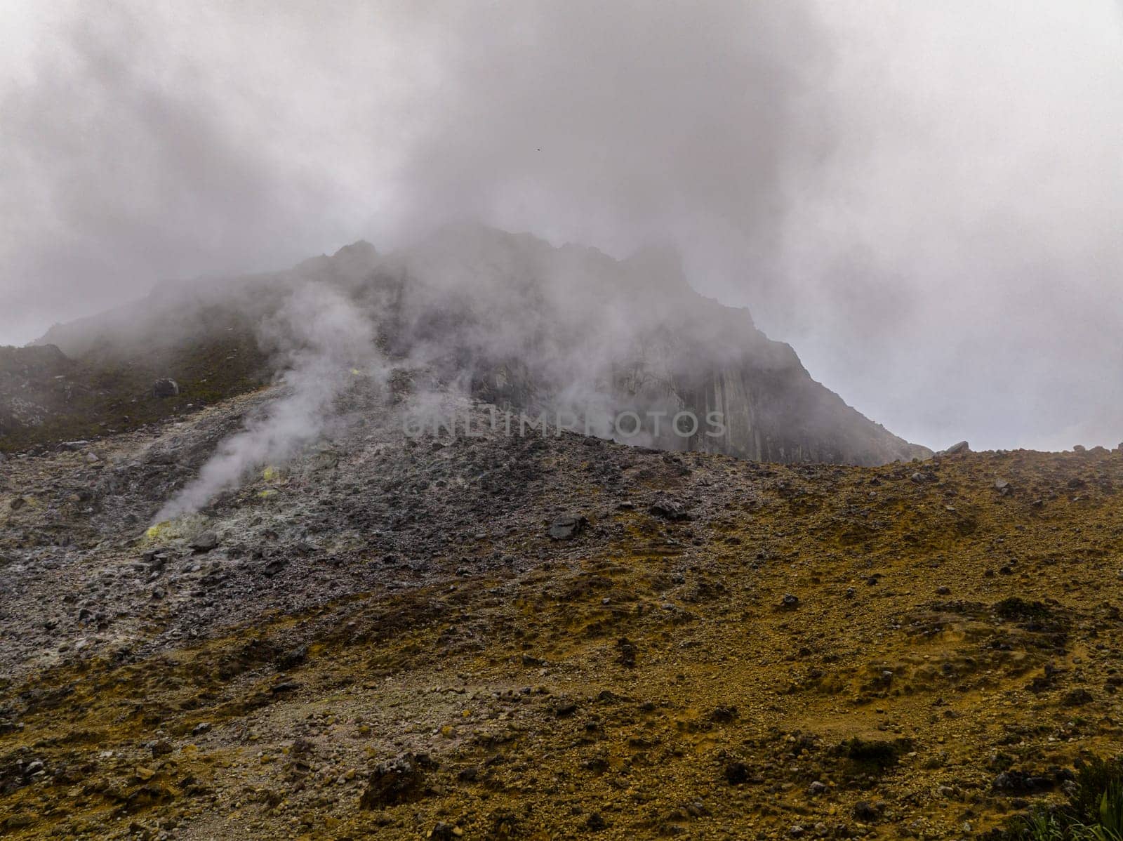 Active volcano Sibayak with smoke and fumaroles. Sumatra, Indonesia.