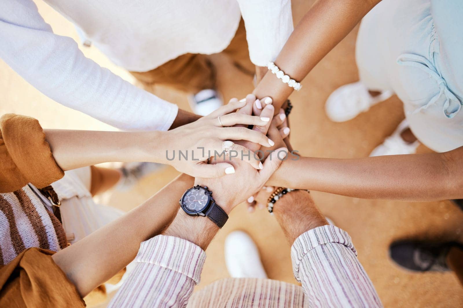 Community, support and diversity with hands of friends on travel or vacation for goals, team building and collaboration. Motivation, vision and networking with group of people in a circle for trust.