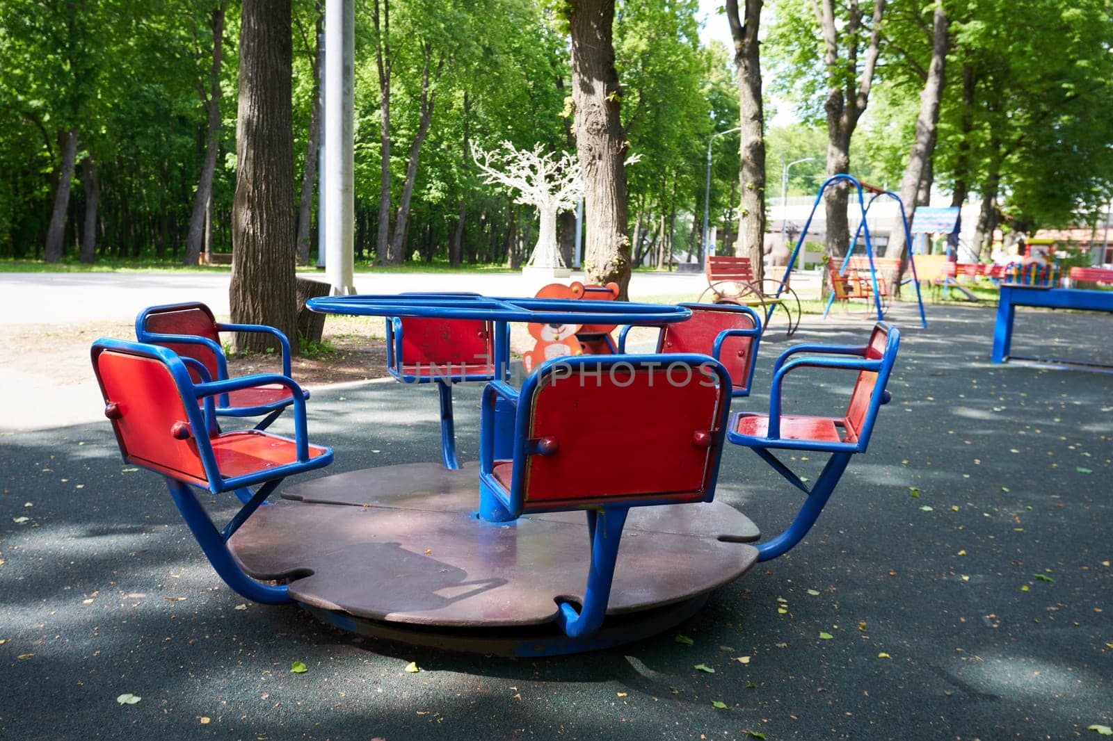 Playground without children in the park on a sunny day