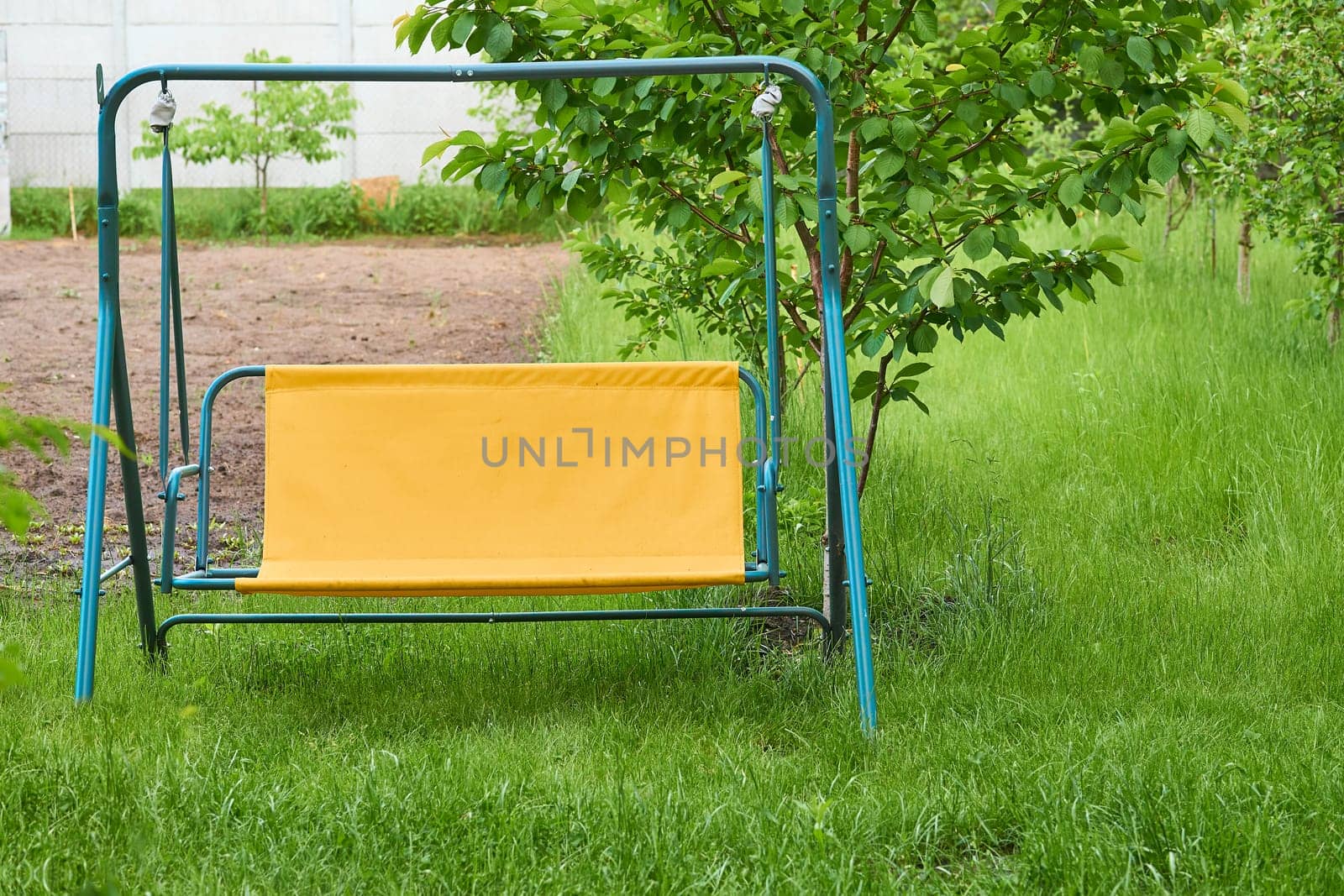 a long plank balanced in the middle on a fixed support, on each end of which children sit and swing