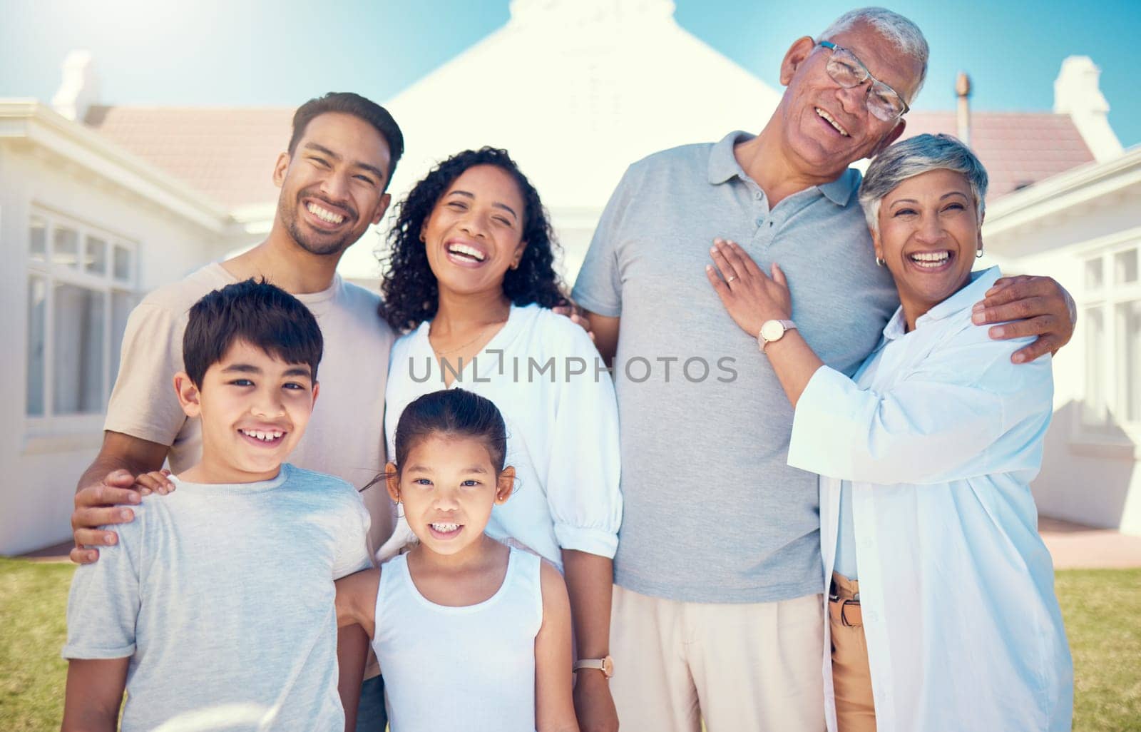 Happy, smile and portrait of big family at new home for bonding, affectionate and care. Relax, quality time and natural with parents and children in garden for happiness, generations and support.