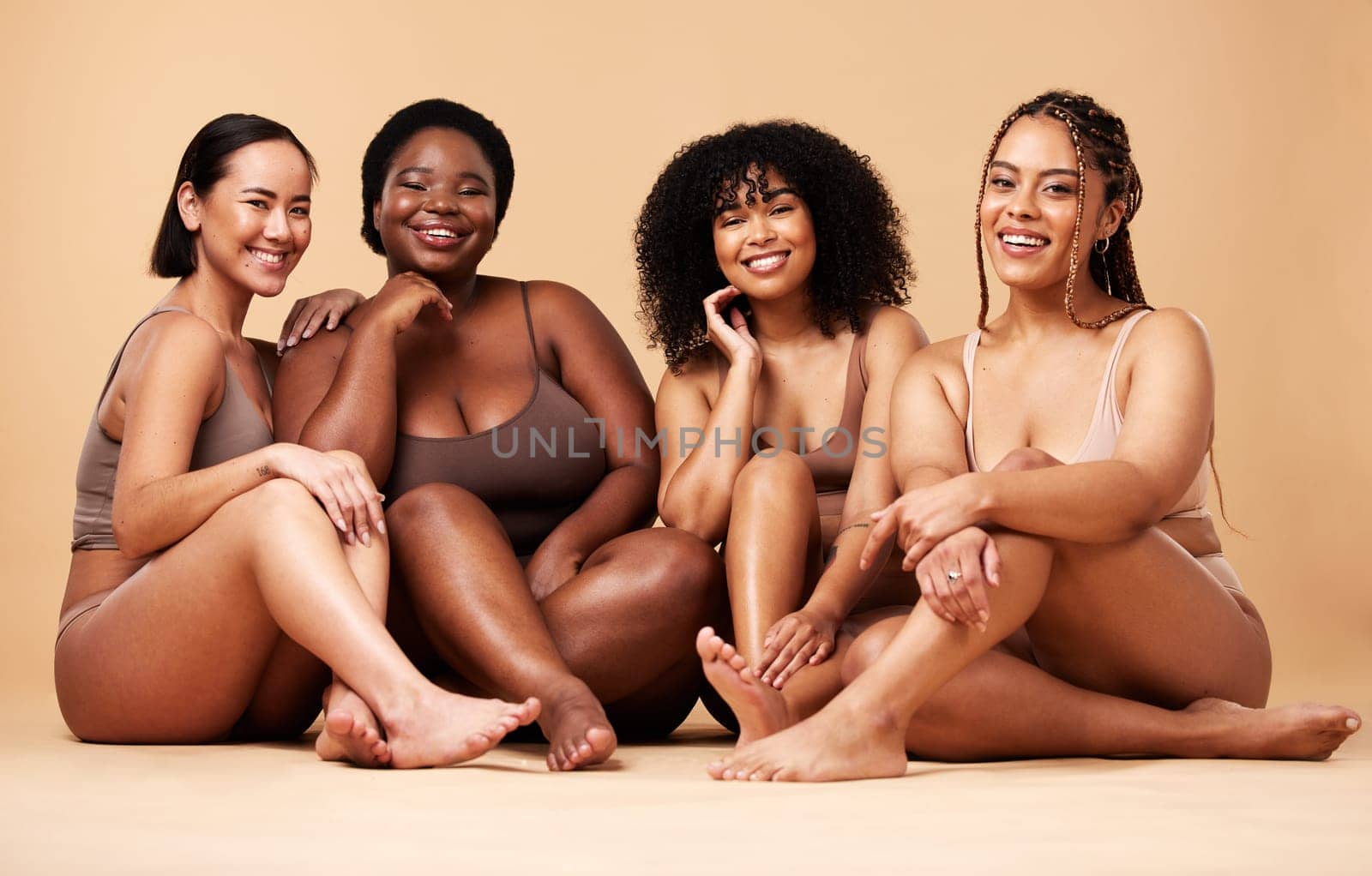 Diversity women, portrait and natural body and skin of group together for inclusion, beauty and power. Aesthetic model people or friend on beige background with pride and motivation for self love by YuriArcurs