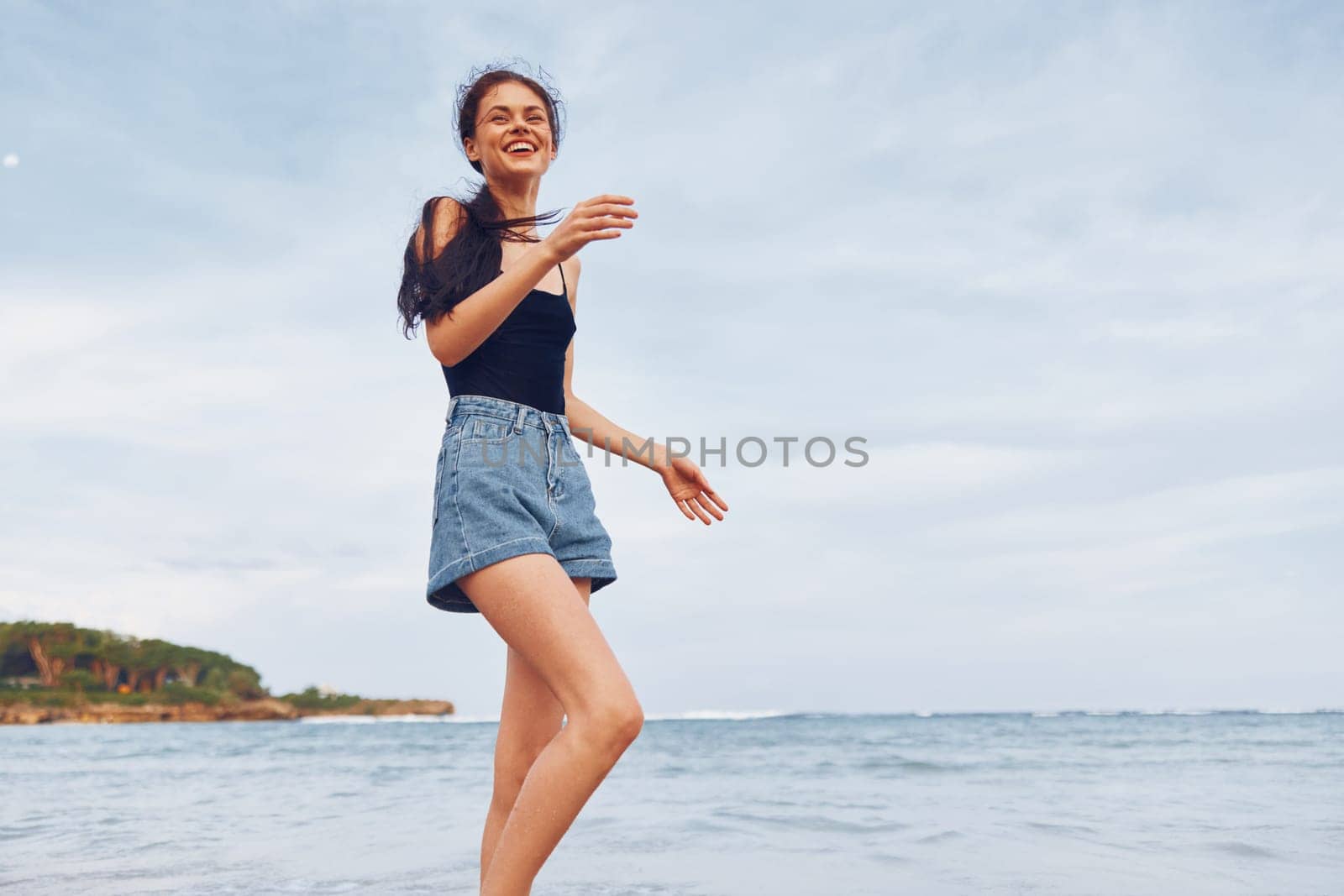 beach woman lifestyle smile sun sea summer young running travel sunset by SHOTPRIME