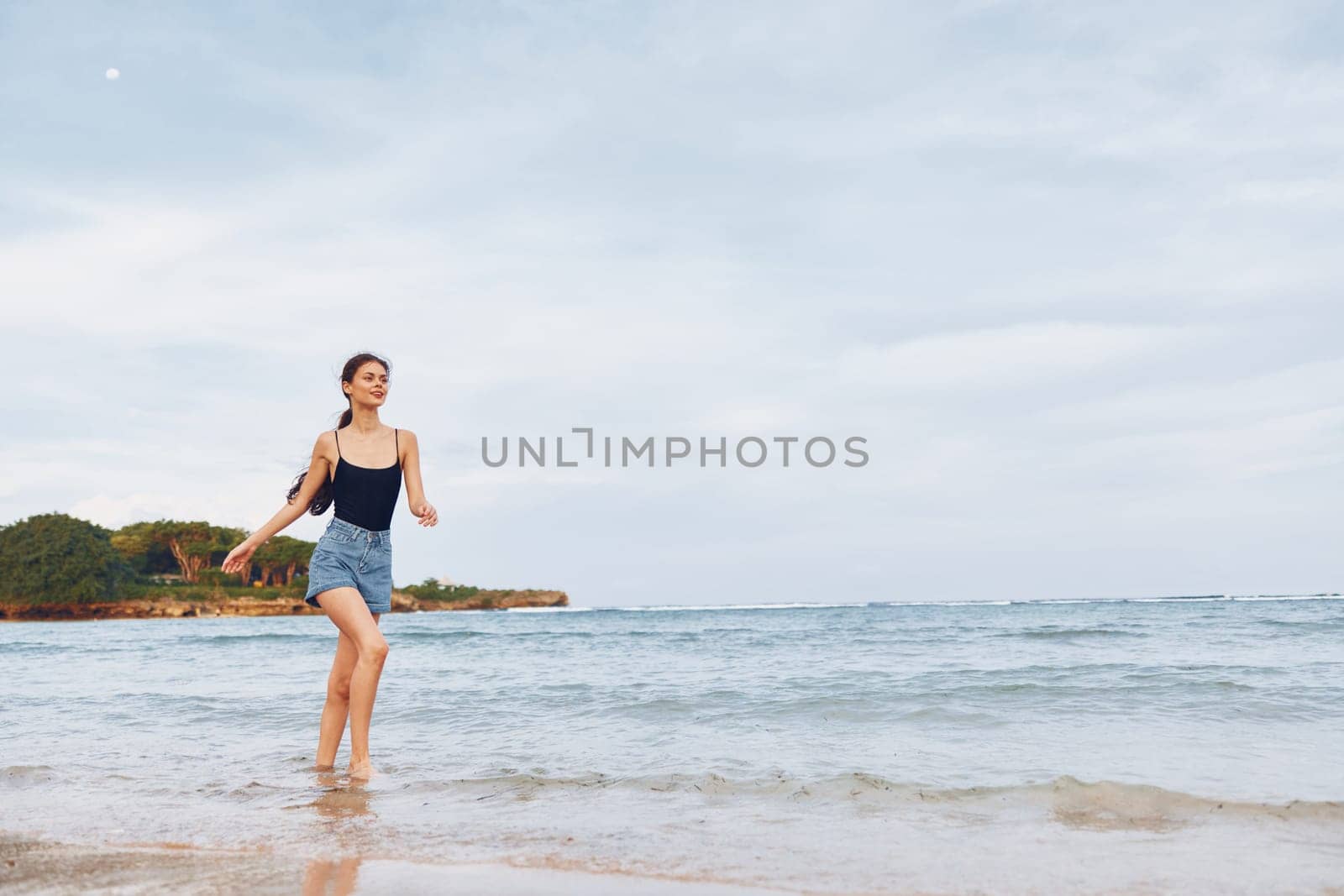 young woman summer lifestyle person positive sea travel beach sexy sand sunrise carefree happiness body wave beautiful sunset smile running freedom