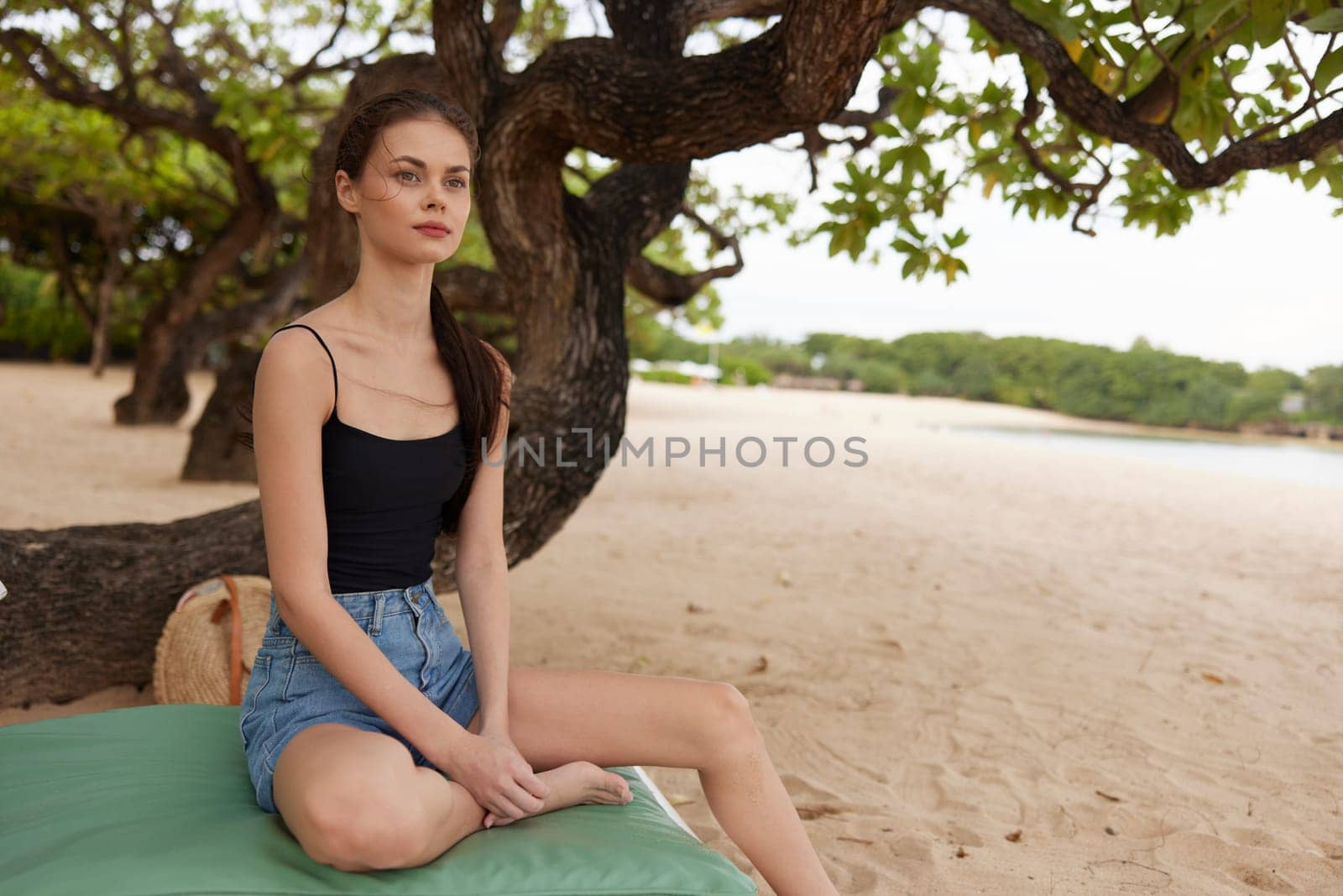 caucasian woman lying girl hair smiling ocean resort sand sea resting swimwear sunbed attractive long chair exotic beach lifestyle person summer relax
