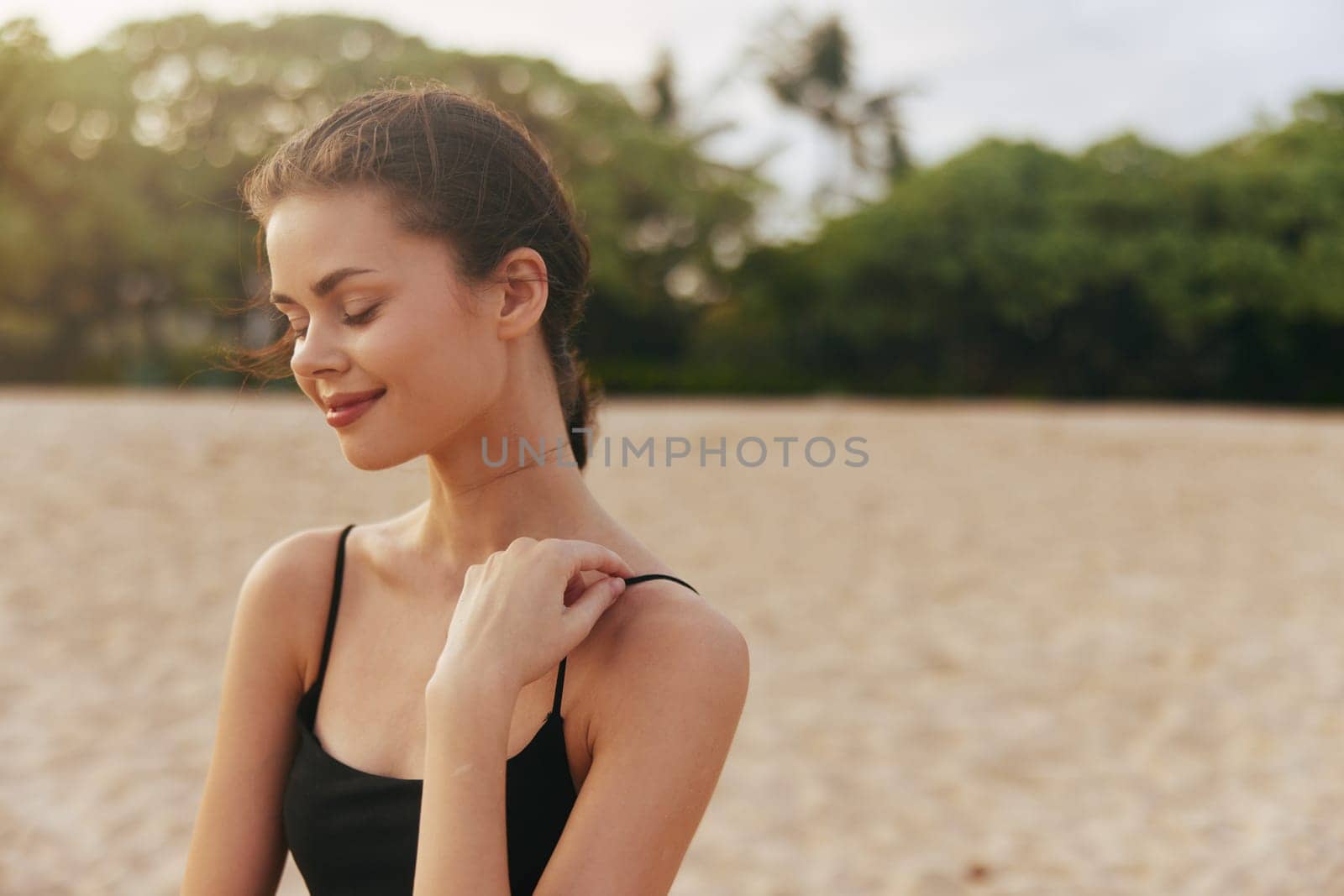 woman tropical sun sea young space summer lifestyle sunset vacation female coast sunlight running copy ocean smile shore holiday adult beach sand