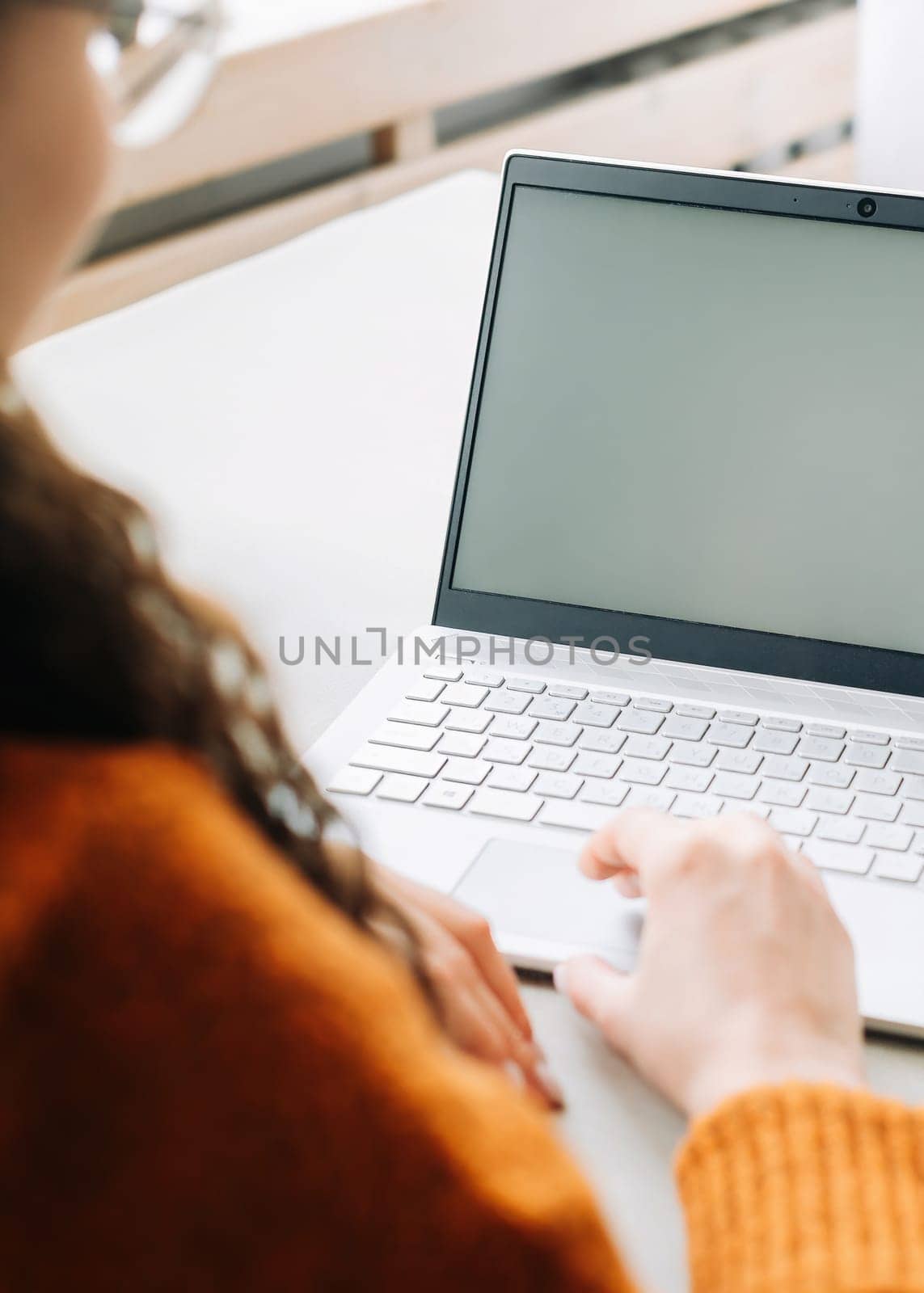 Remote Learning with Laptop: Woman Student Viewing Blank Screen Mockup for E-Learning Website, Online Education and Working Remotely.