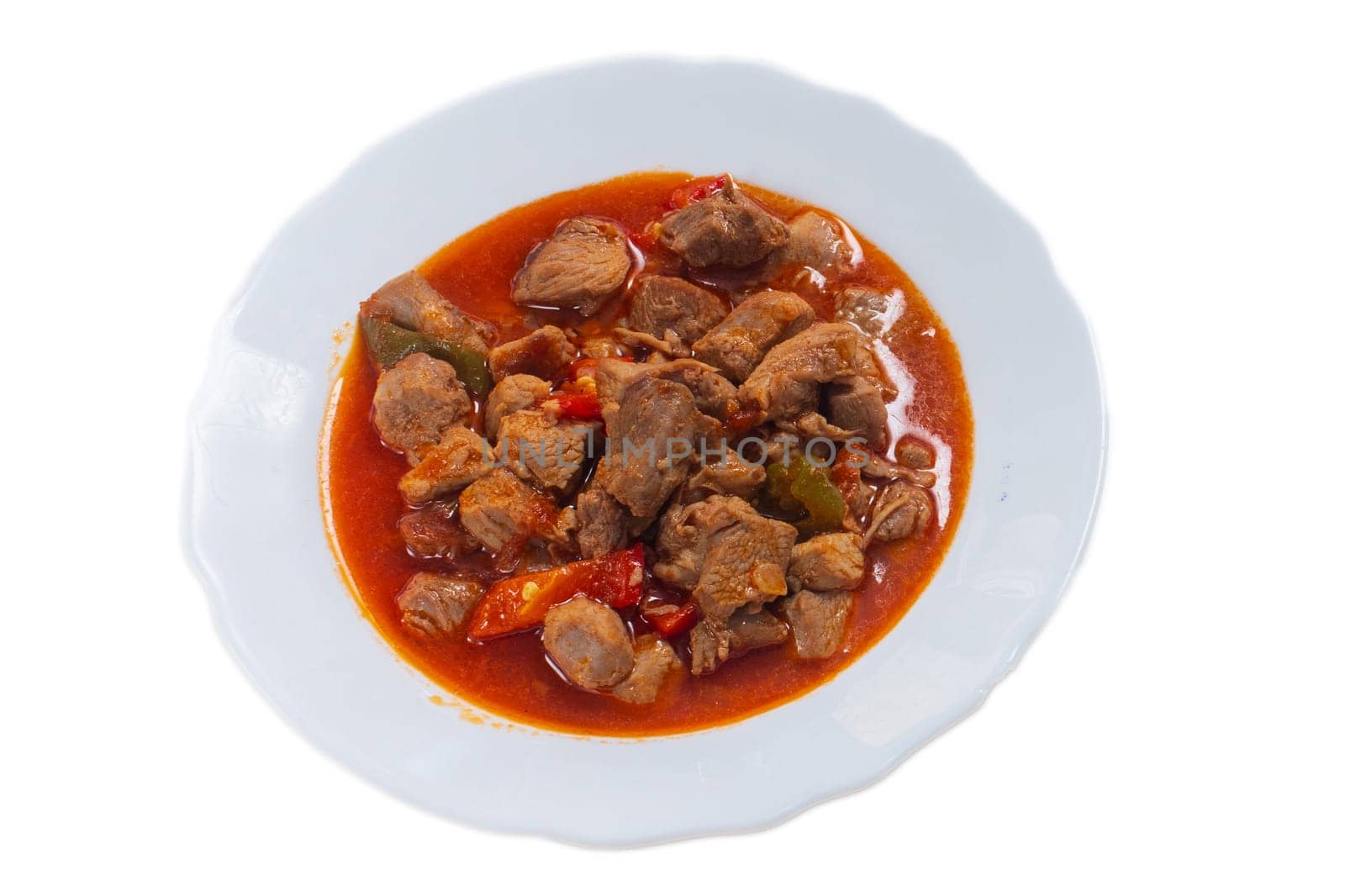 beef stew in tomato sauce traditional Georgian dish chashushuli white background top view. High quality photo