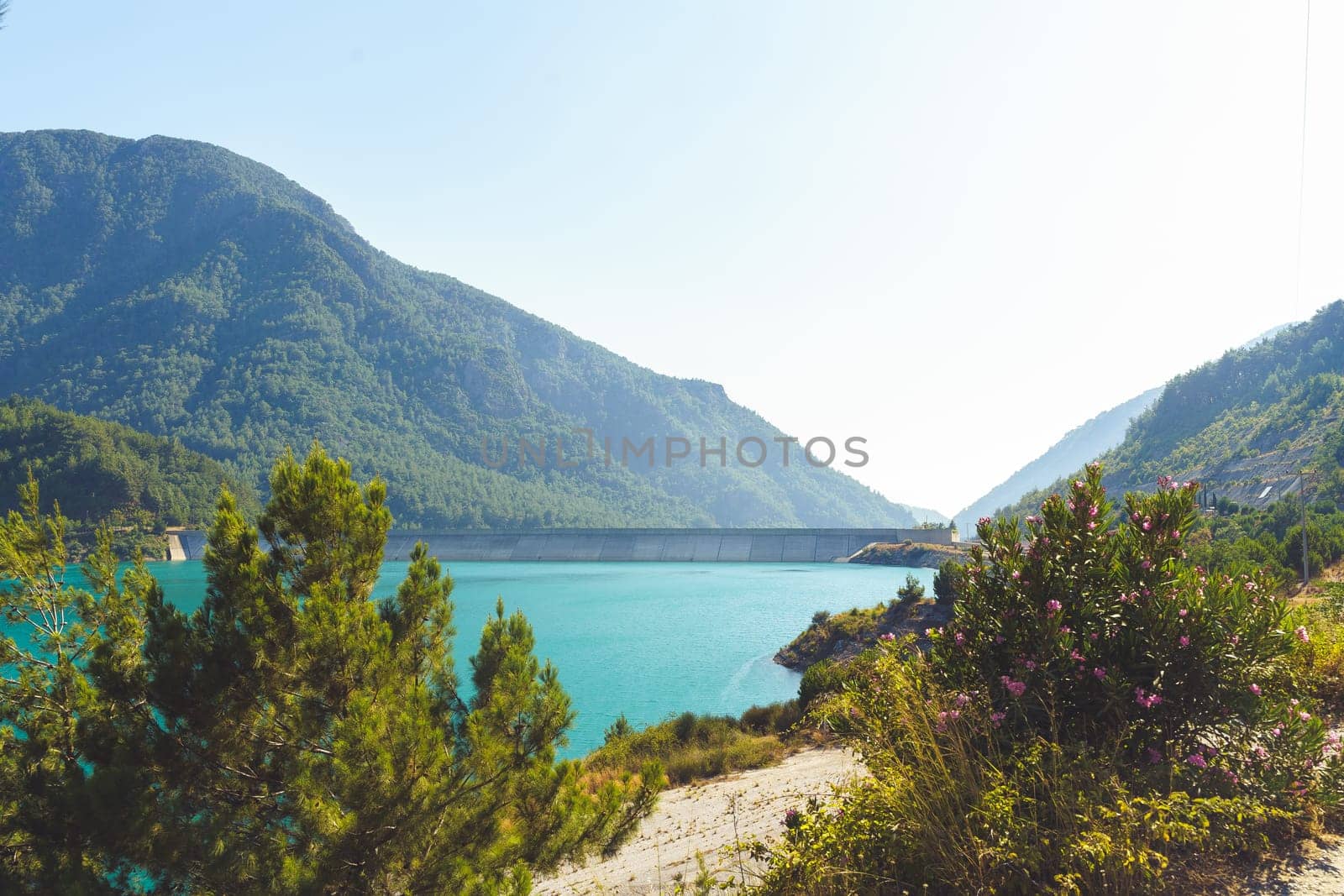 Scenic seascape view of a sea bay surrounded with mountains. Peaceful landscape picture of coastline taken from the mountain top. by Ostanina