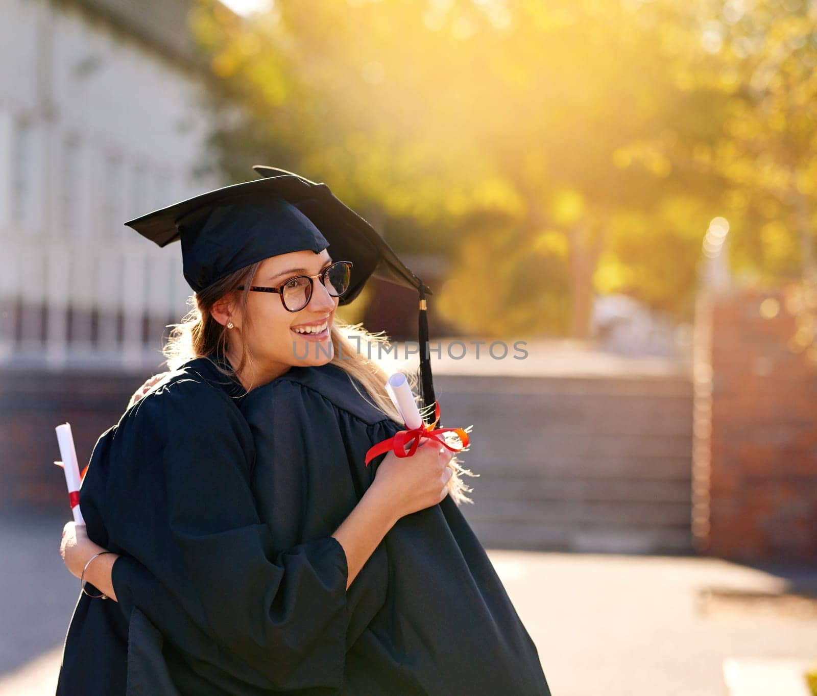 Women, students and hug at graduation as college or university friends with achievement. Happy people outdoor to celebrate education goals, certificate of success or future at school event with pride.