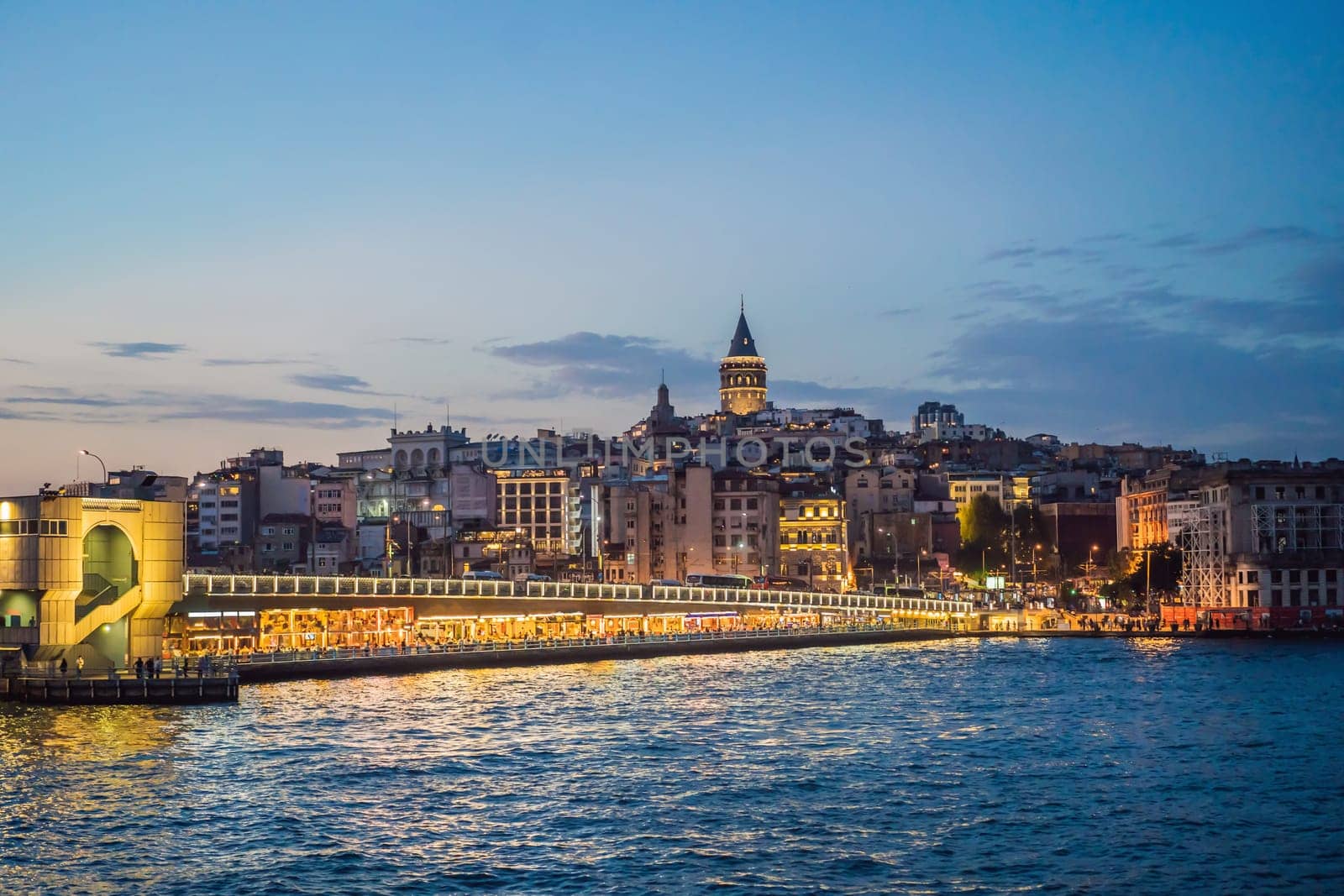 Istanbul city skyline in Turkey, Beyoglu district old houses with Galata tower on top, view from the Golden Horn by galitskaya