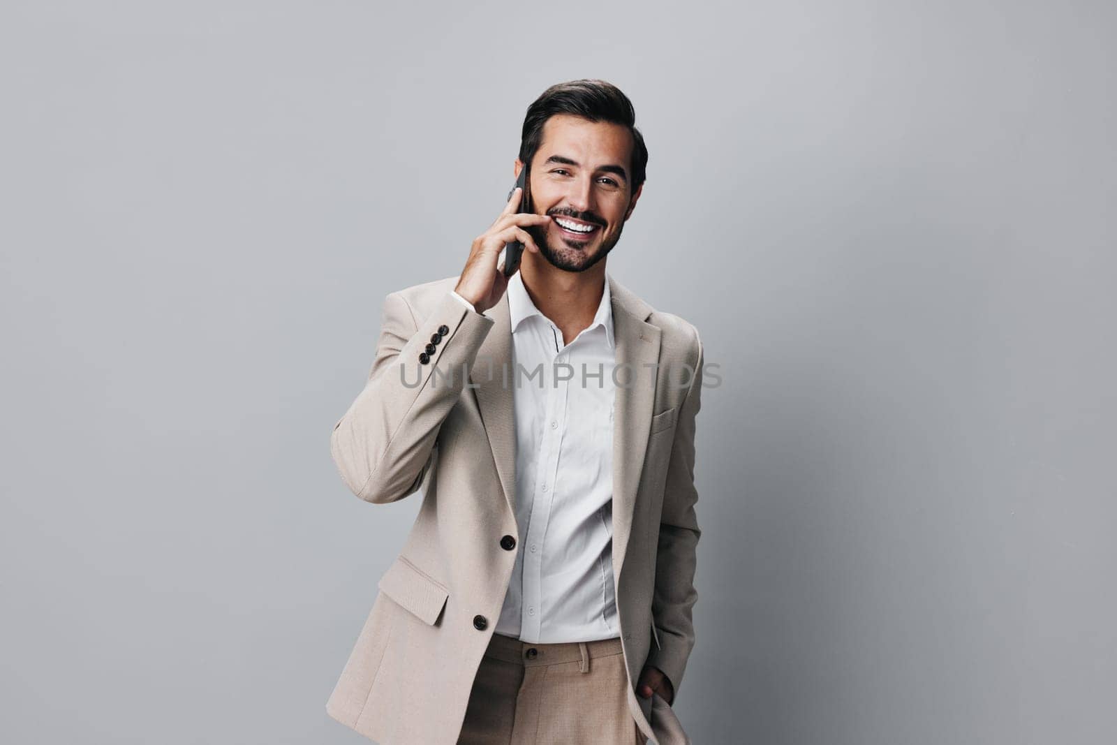 man happy communication smartphone suit success app online phone smile isolated business hold young trading businessman adult confident call portrait white