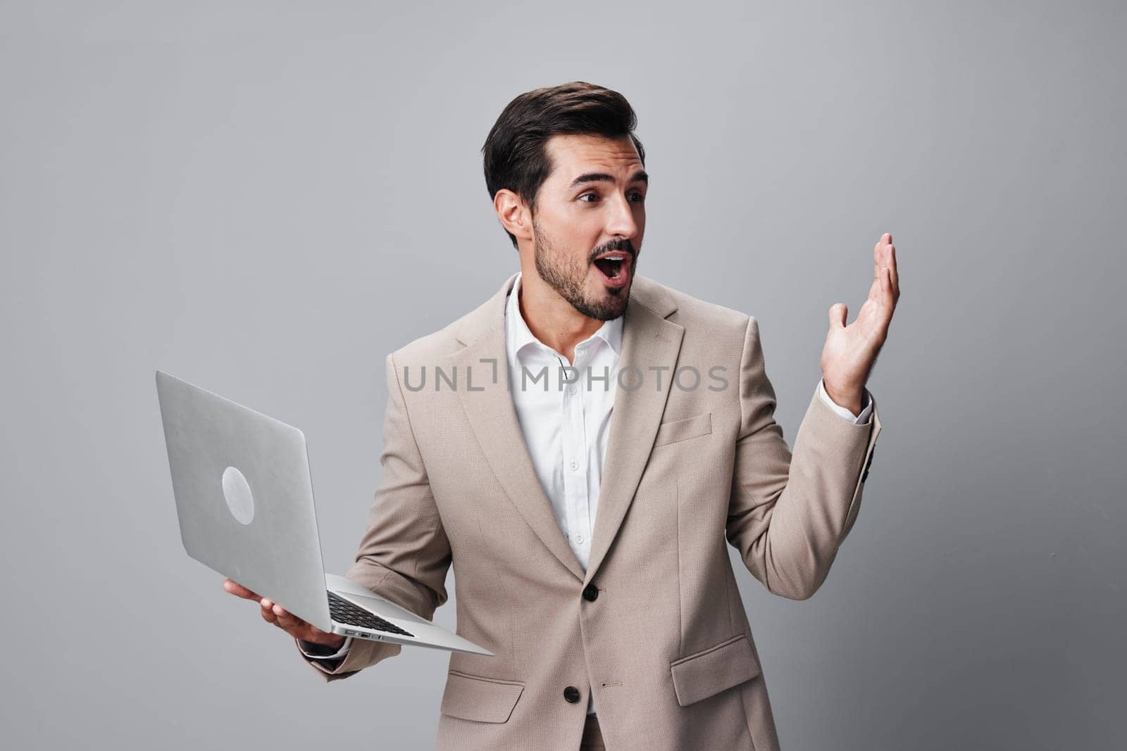 man smiling freelancer online shirt job computer laptop person beige model internet network beard cheerful copyspace cyberspace office business stylish suit