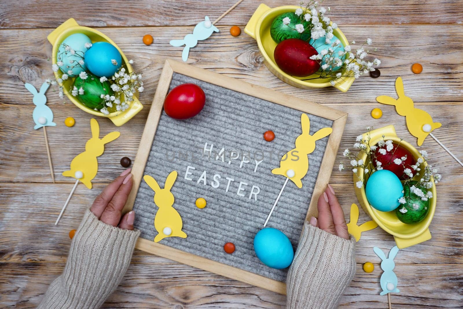 A bright greeting card with a wish for a happy Easter by Spirina