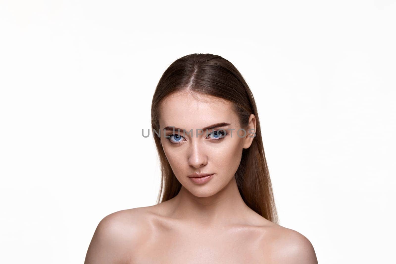 beautiful young woman with perfect skin on white background