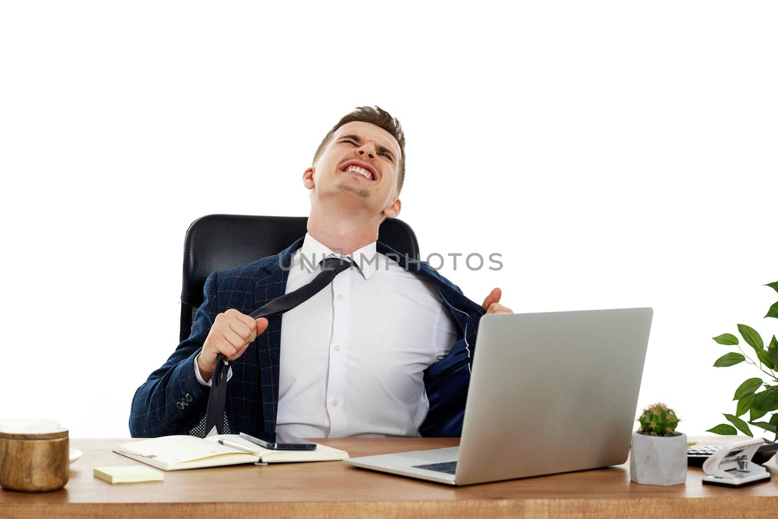 angry businessman shouting loudly, sitting on chair at desk and having problems